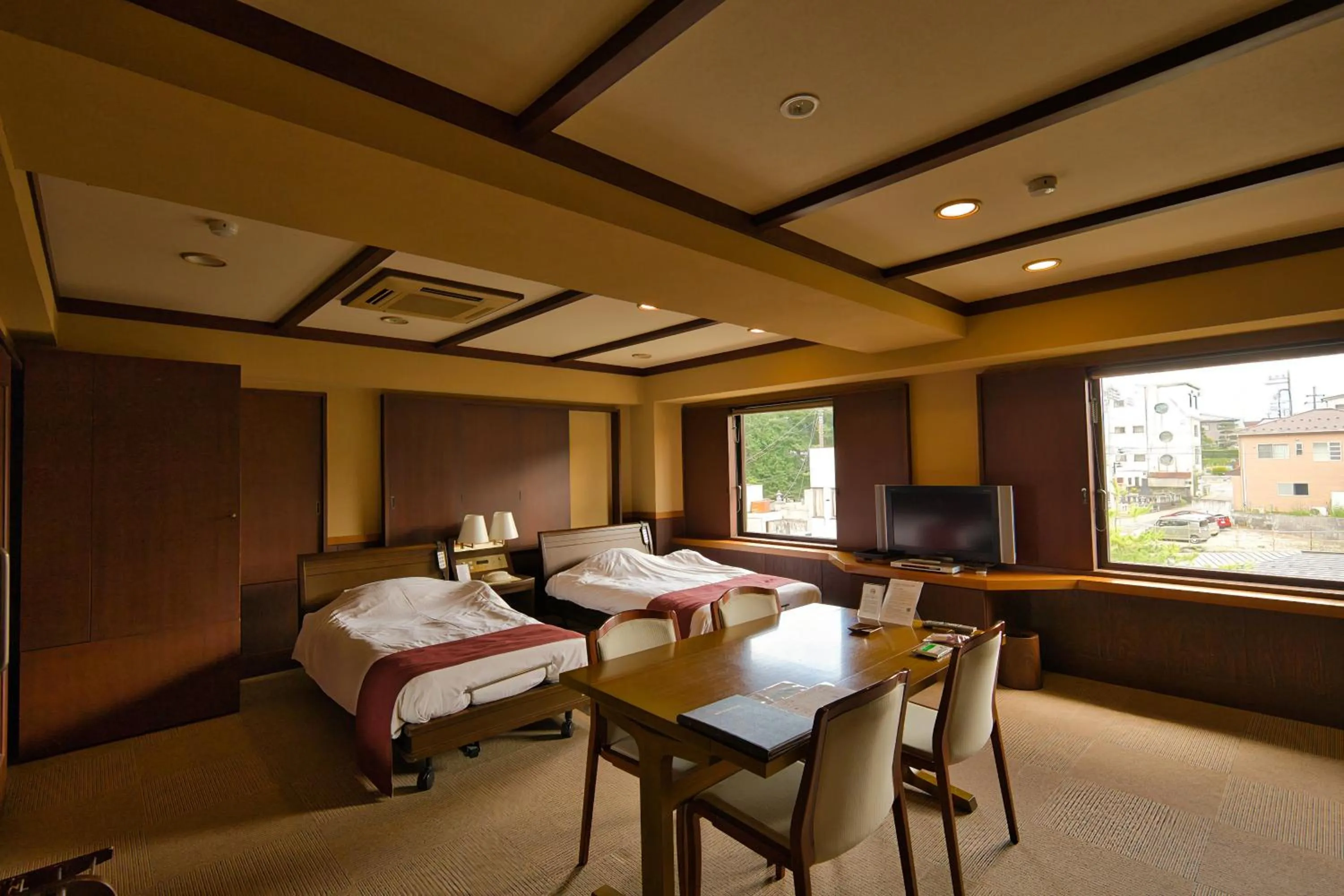 Bed in Fuji Lake Hotel