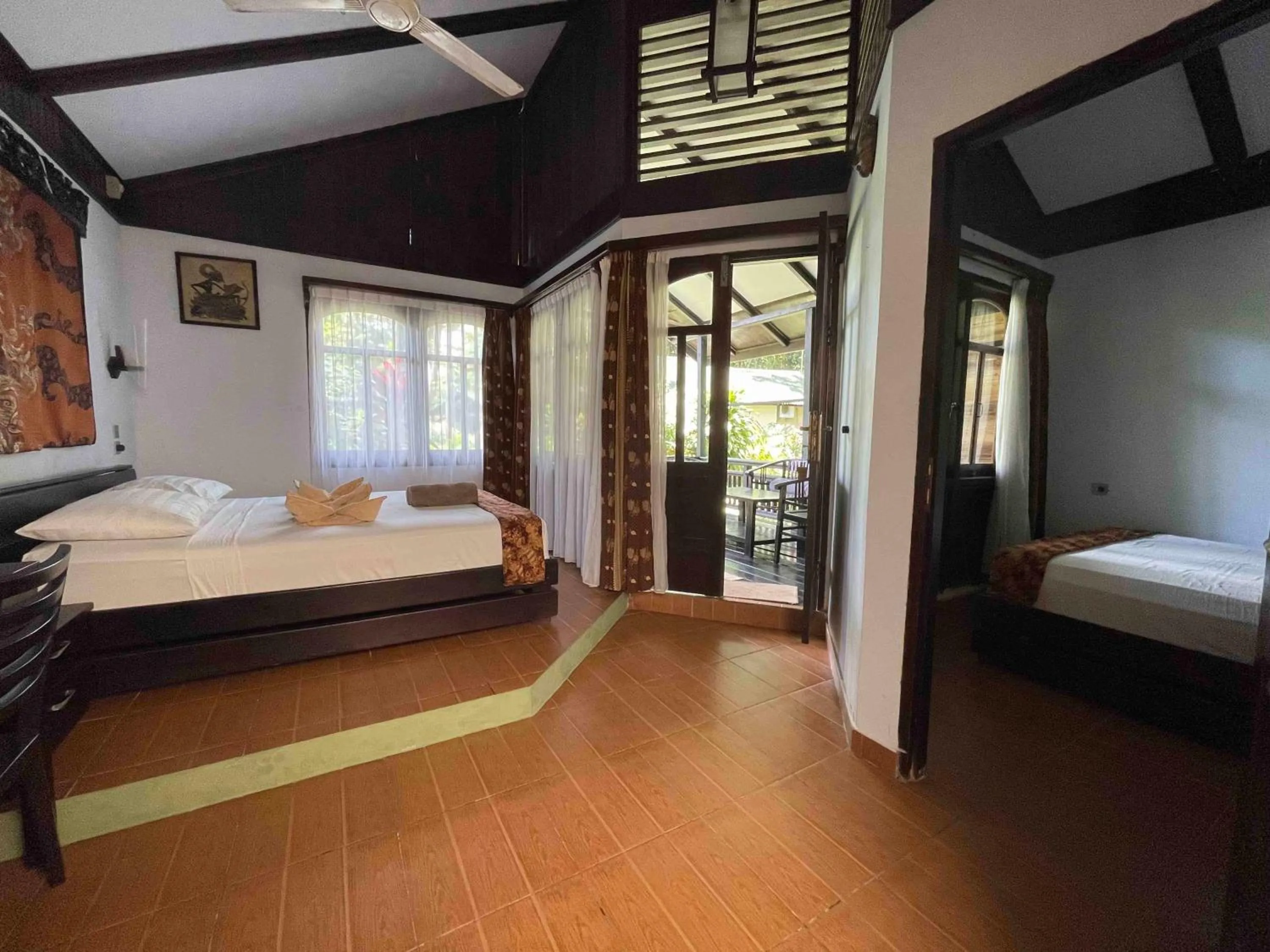 Photo of the whole room, Bed in The Village Bunaken