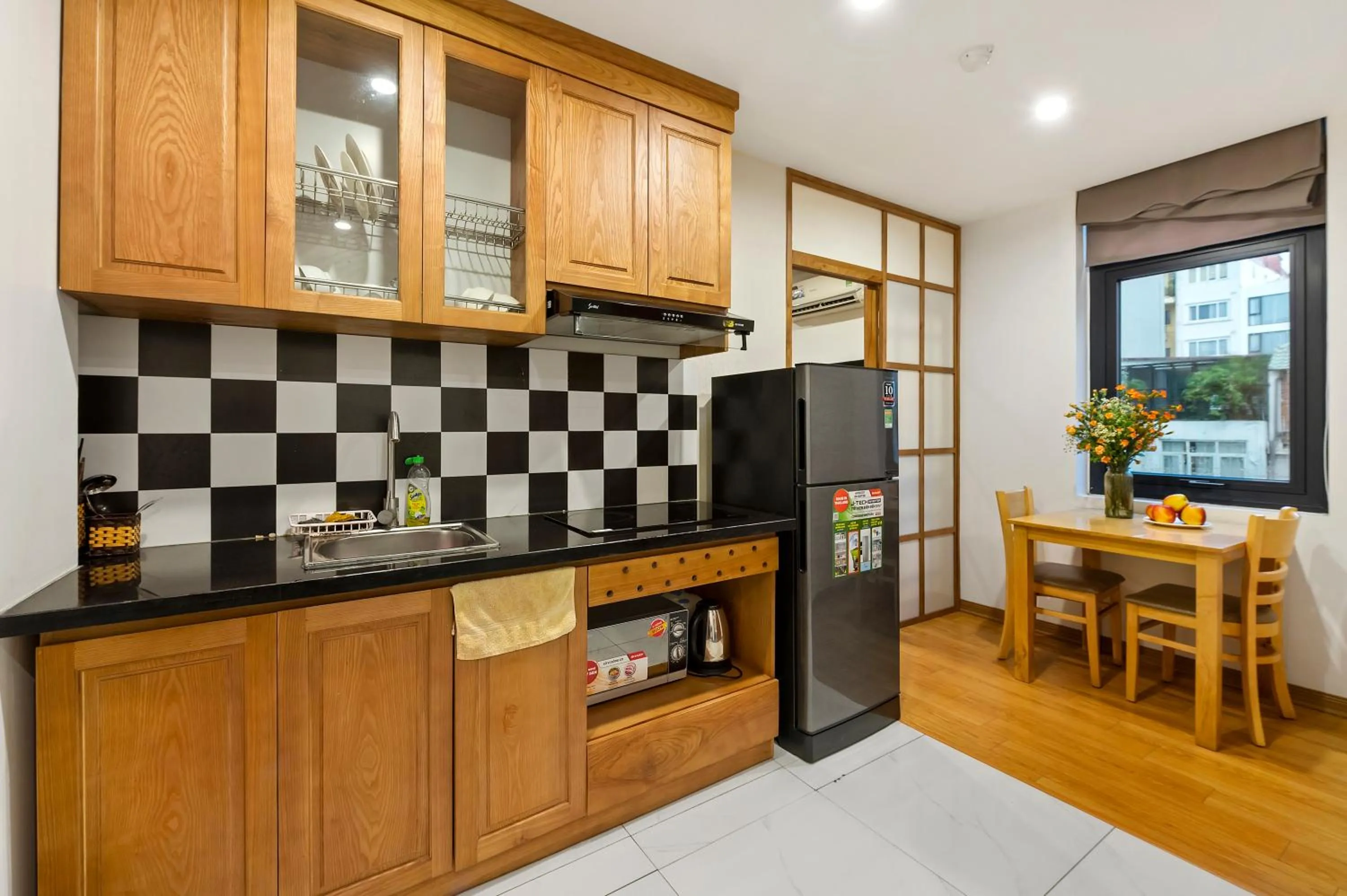 Kitchen or kitchenette in 22Housing luxury Hotel & Residence 39 Linh Lang