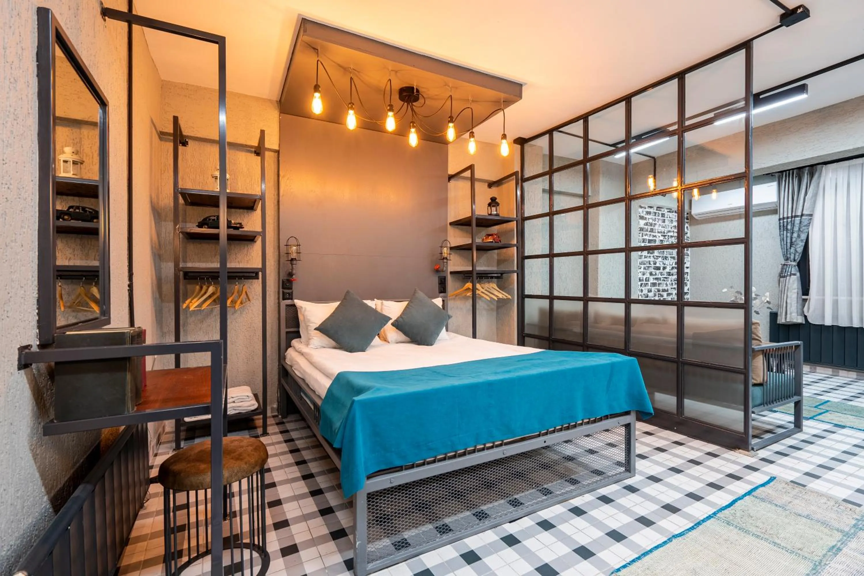 Photo of the whole room, Bed in Cube Suites