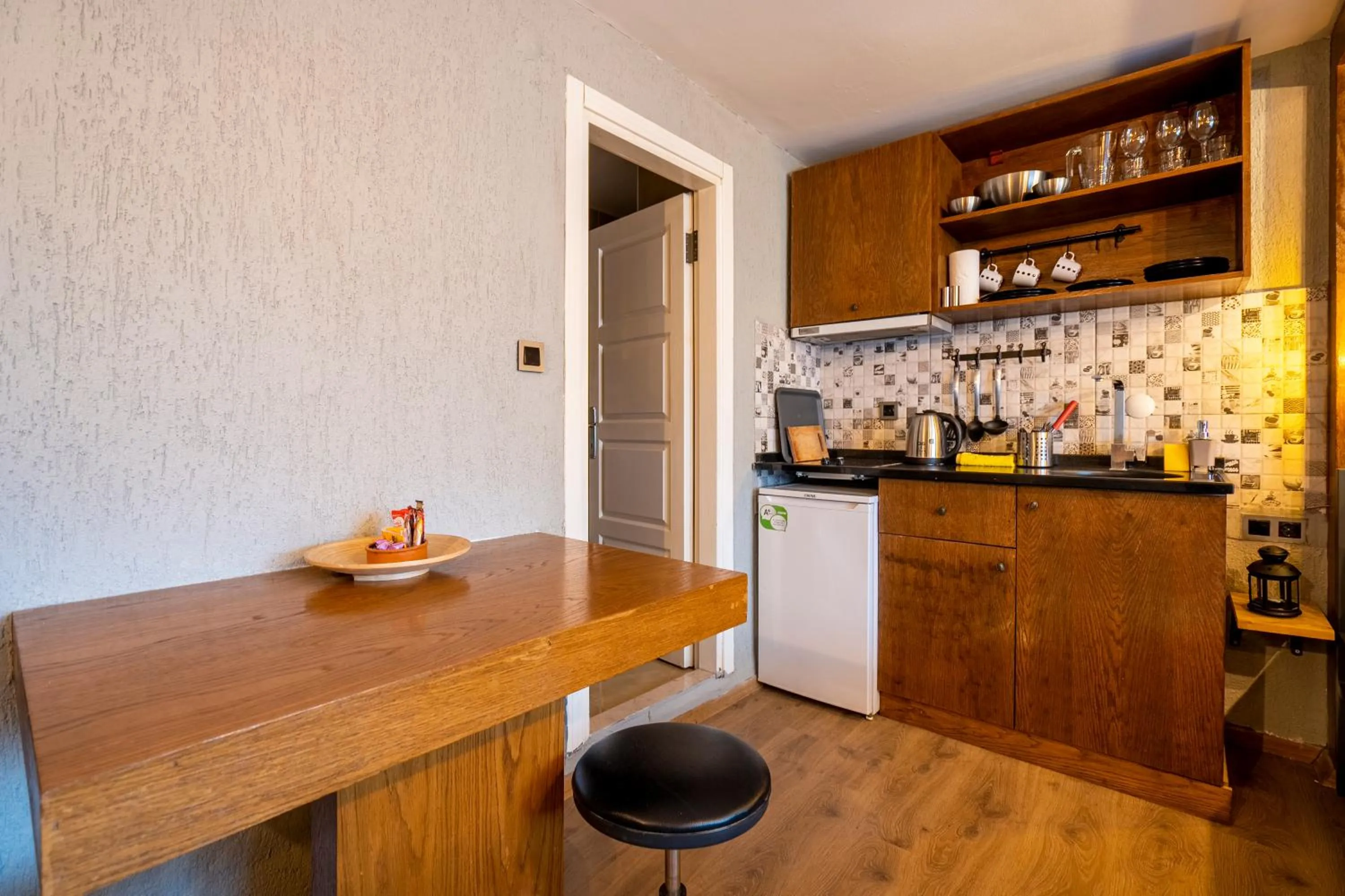 Kitchen or kitchenette in Cube Suites