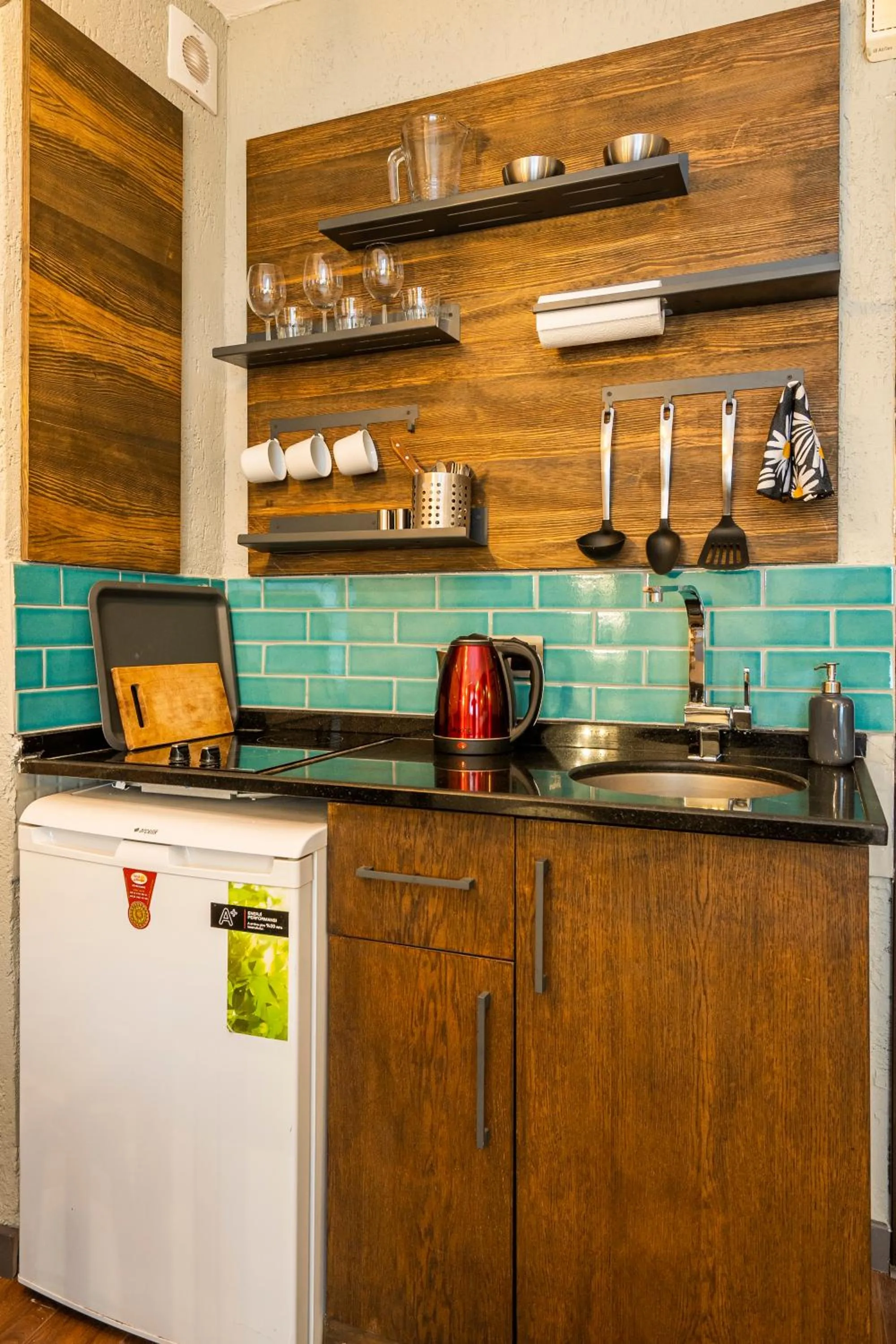 Kitchen or kitchenette in Cube Suites