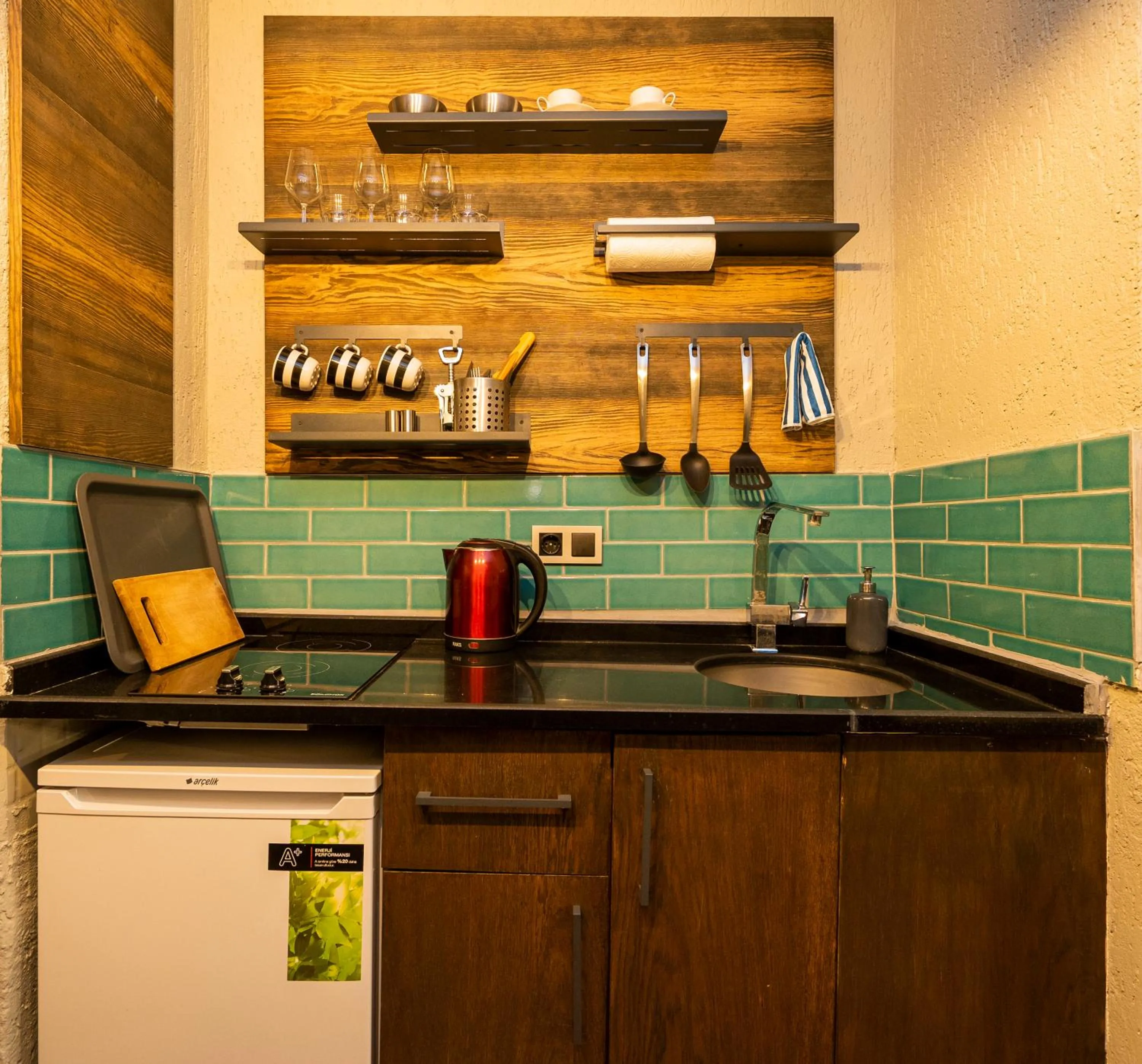 Kitchen or kitchenette in Cube Suites