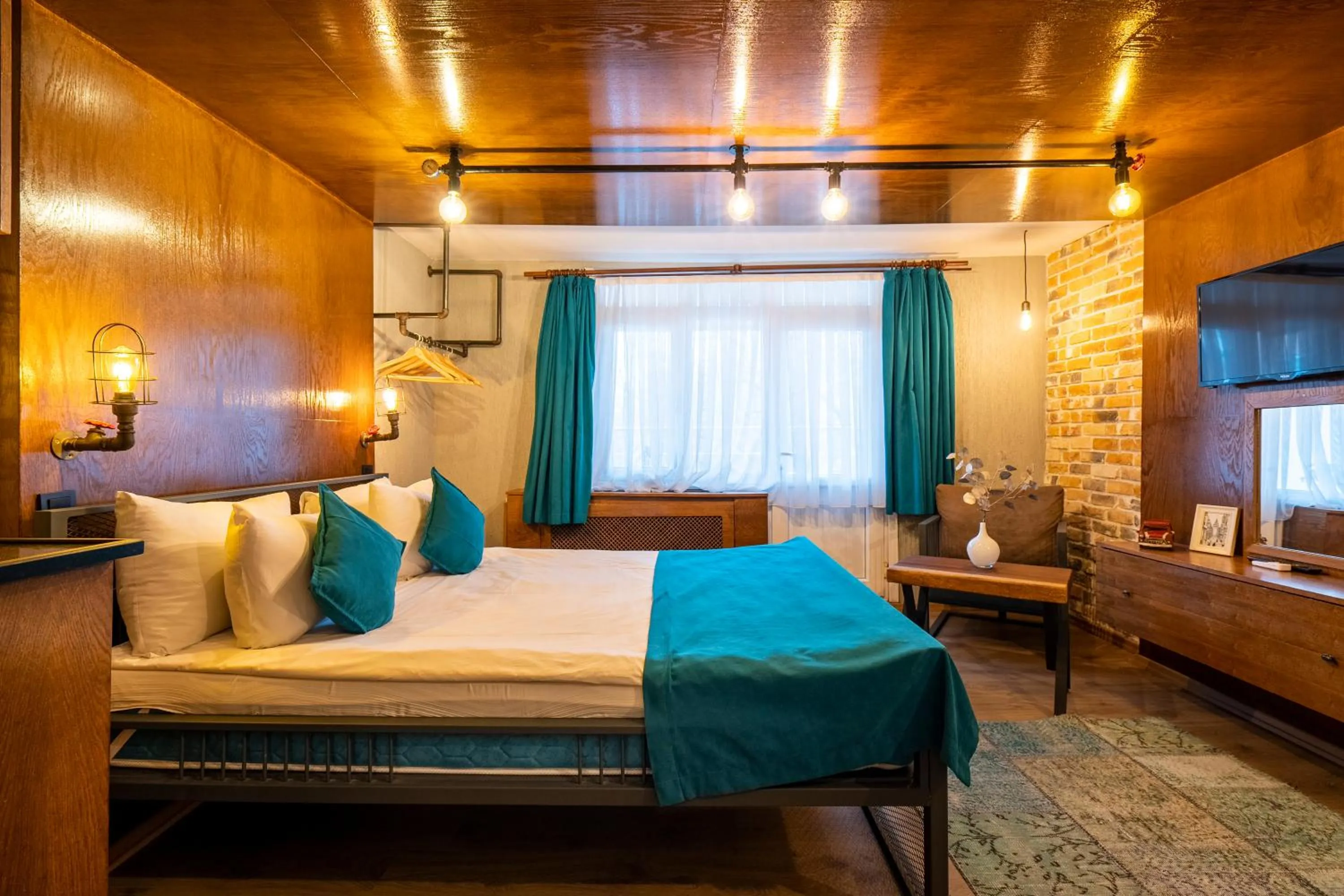 Photo of the whole room, Bed in Cube Suites