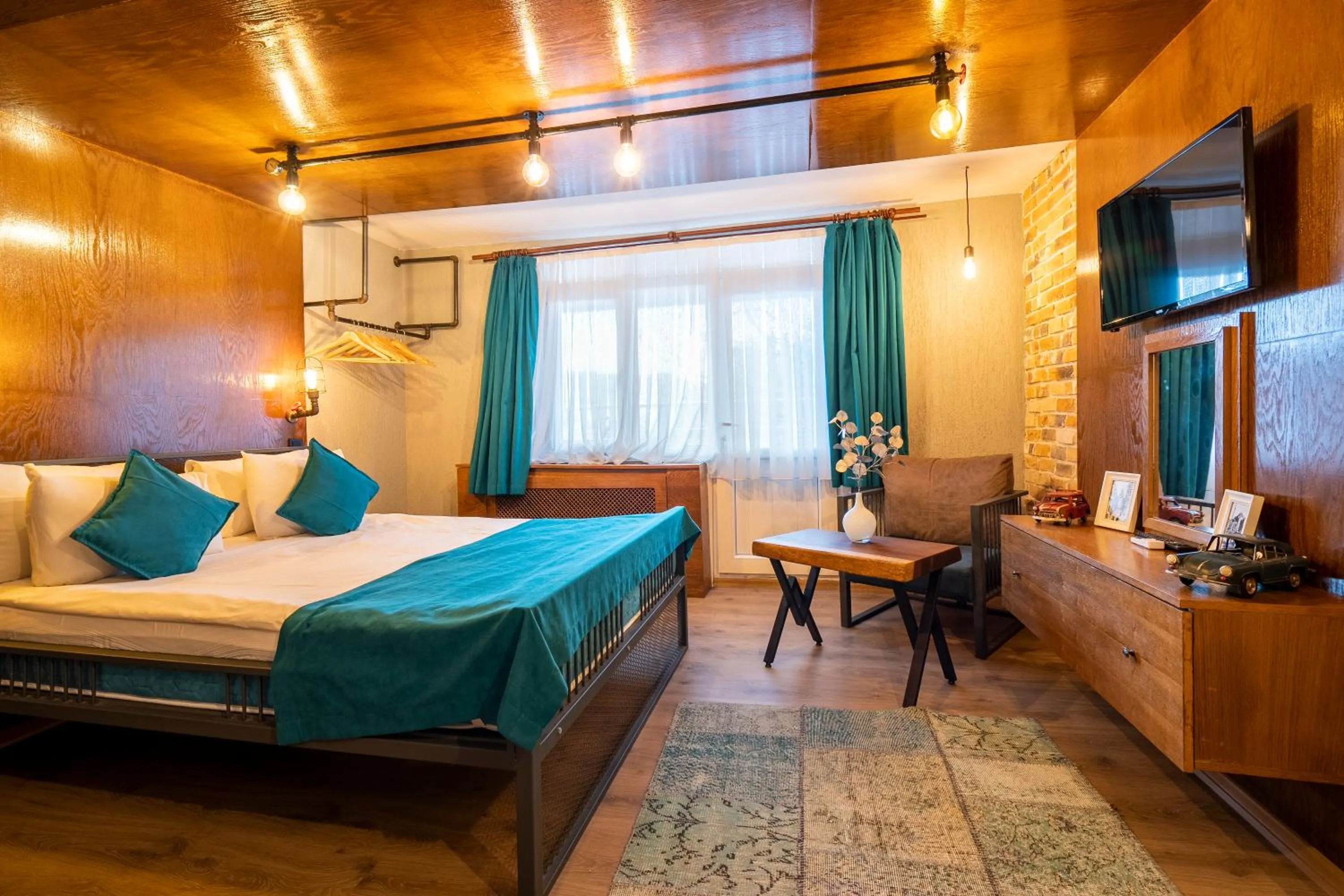 Photo of the whole room, Bed in Cube Suites