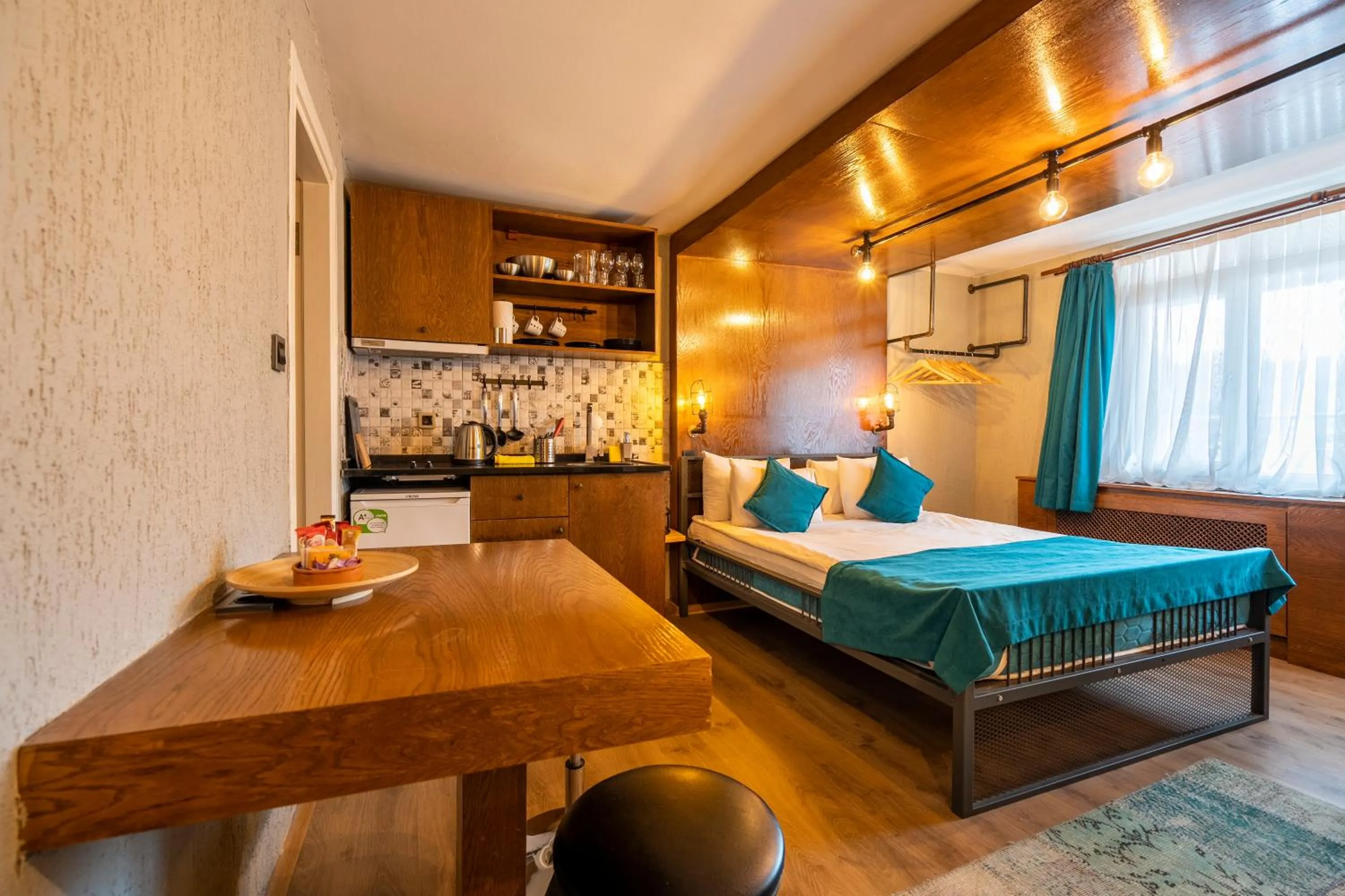 Photo of the whole room, Bed in Cube Suites