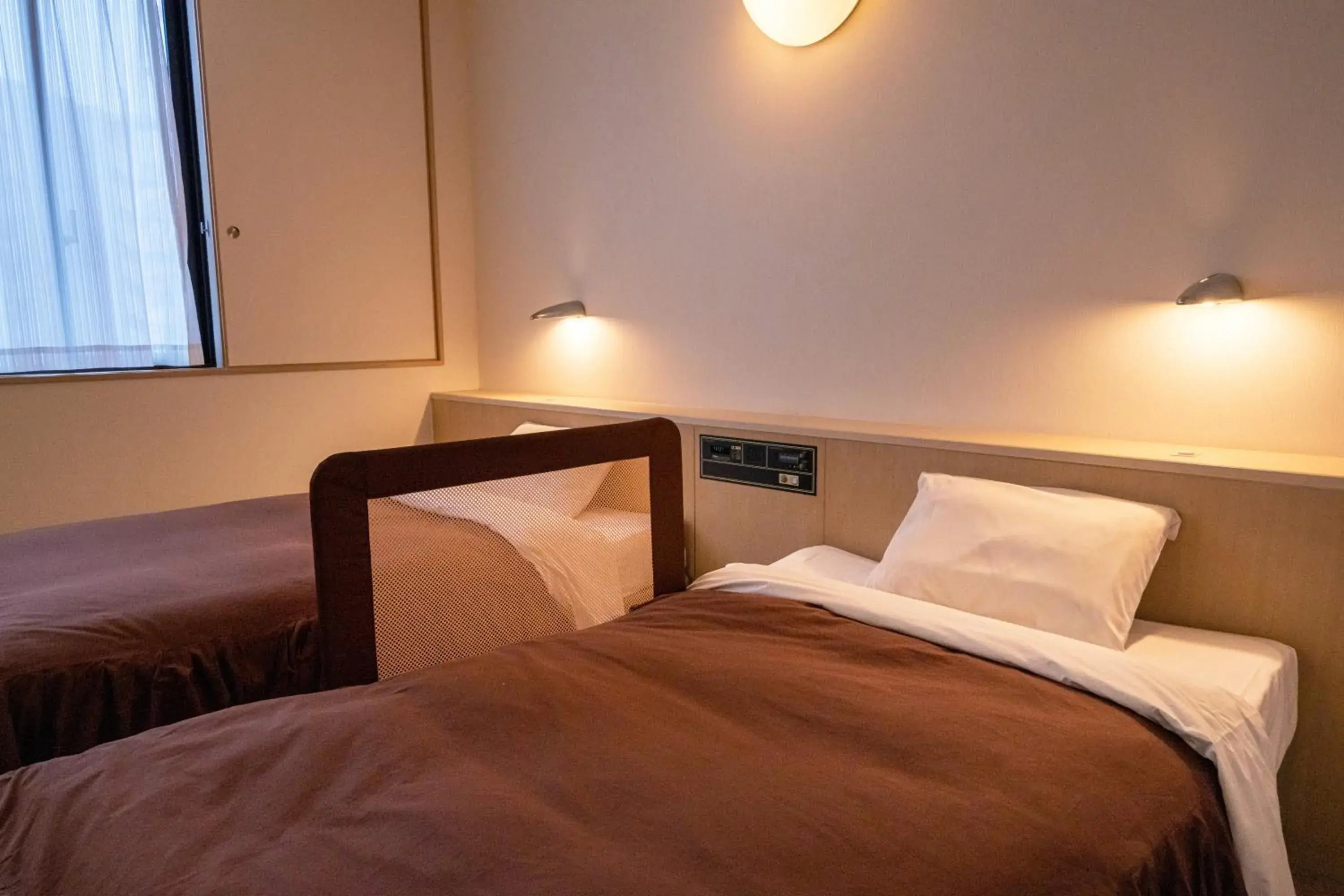 Bed in Chigusa Hotel Bed in Chigusa Hotel