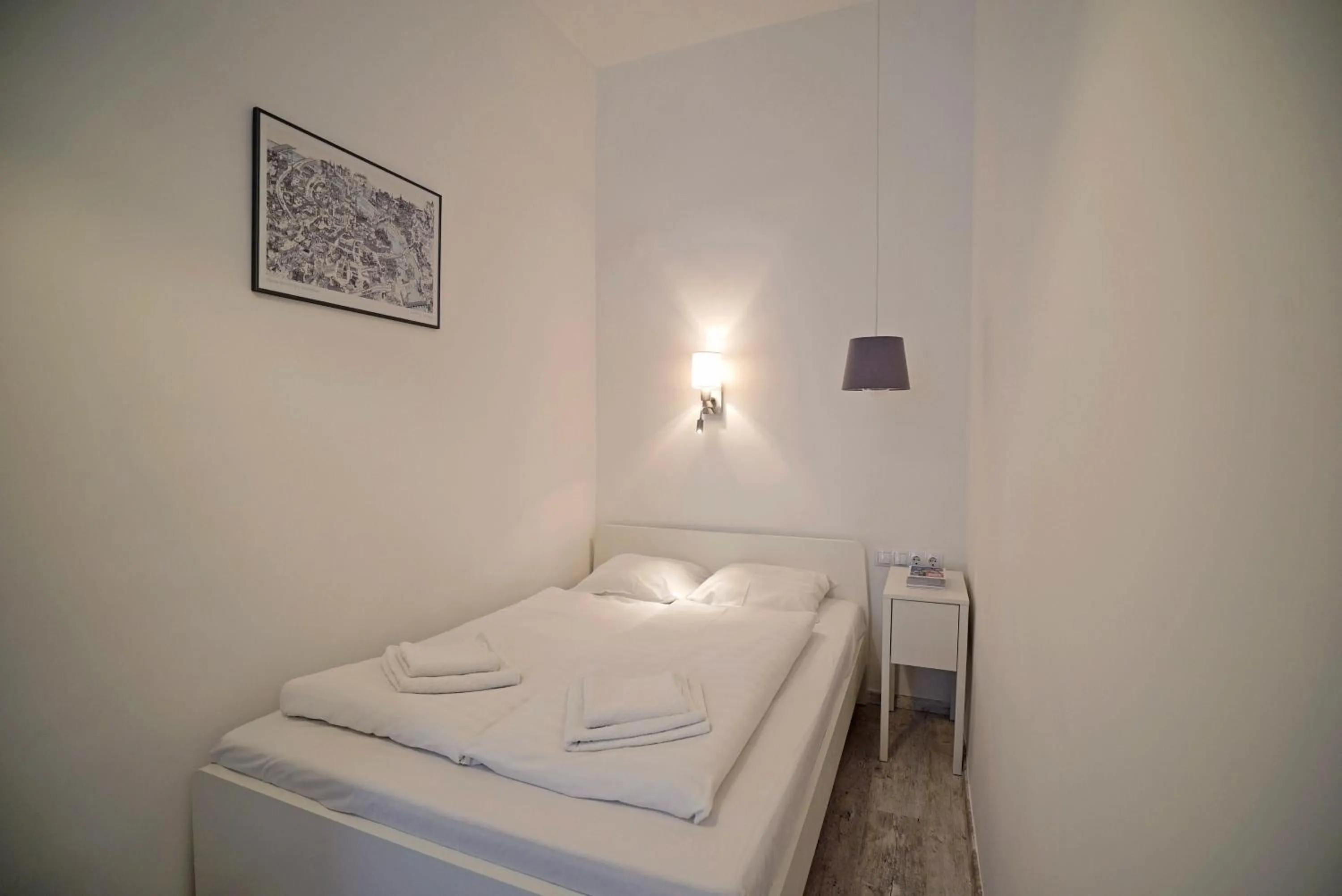 Bed in Rumbach Apartment