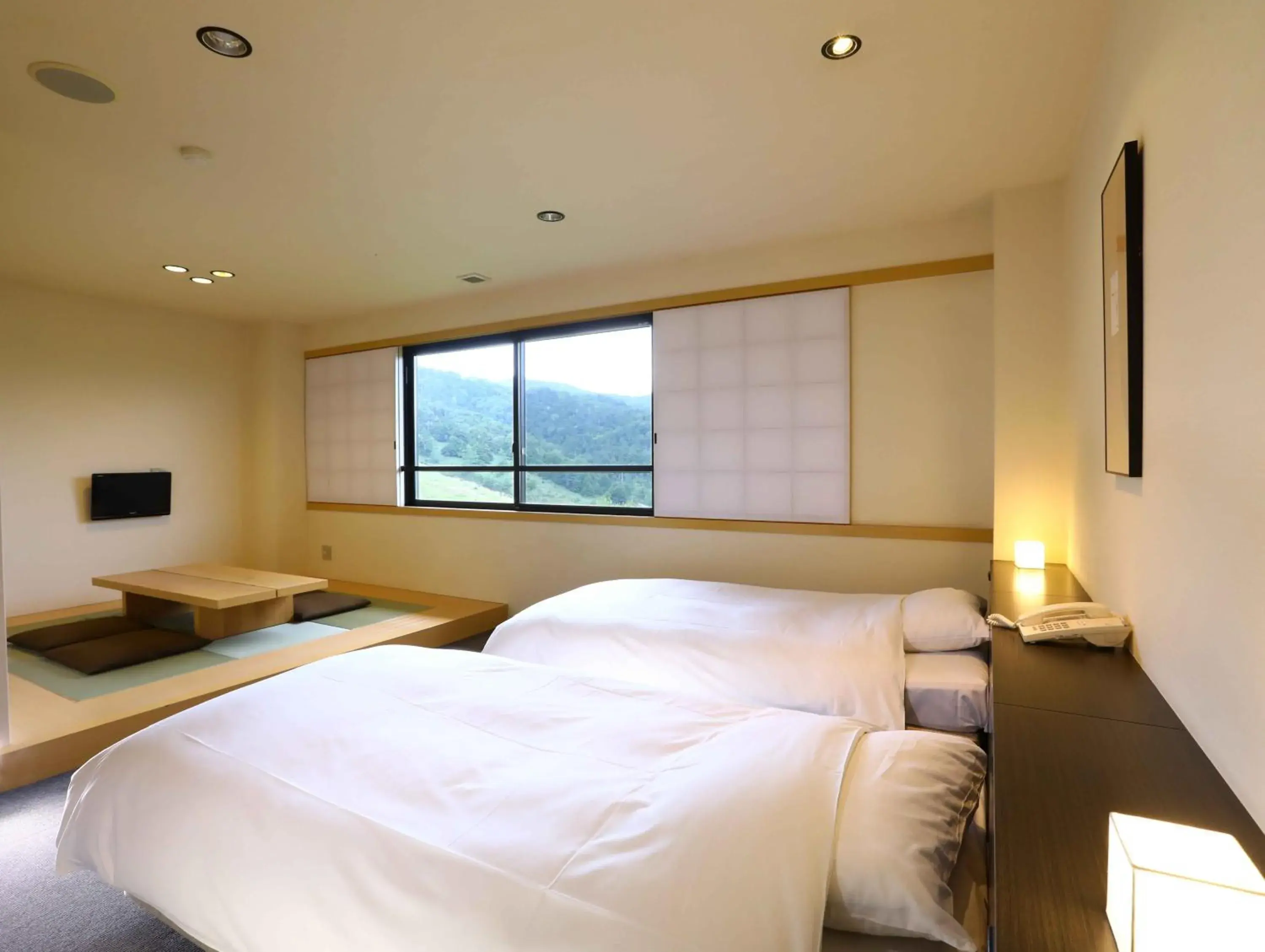 Photo of the whole room, Bed in Manza Onsen Nisshinkan Photo of the whole room, Bed in Manza Onsen Nisshinkan