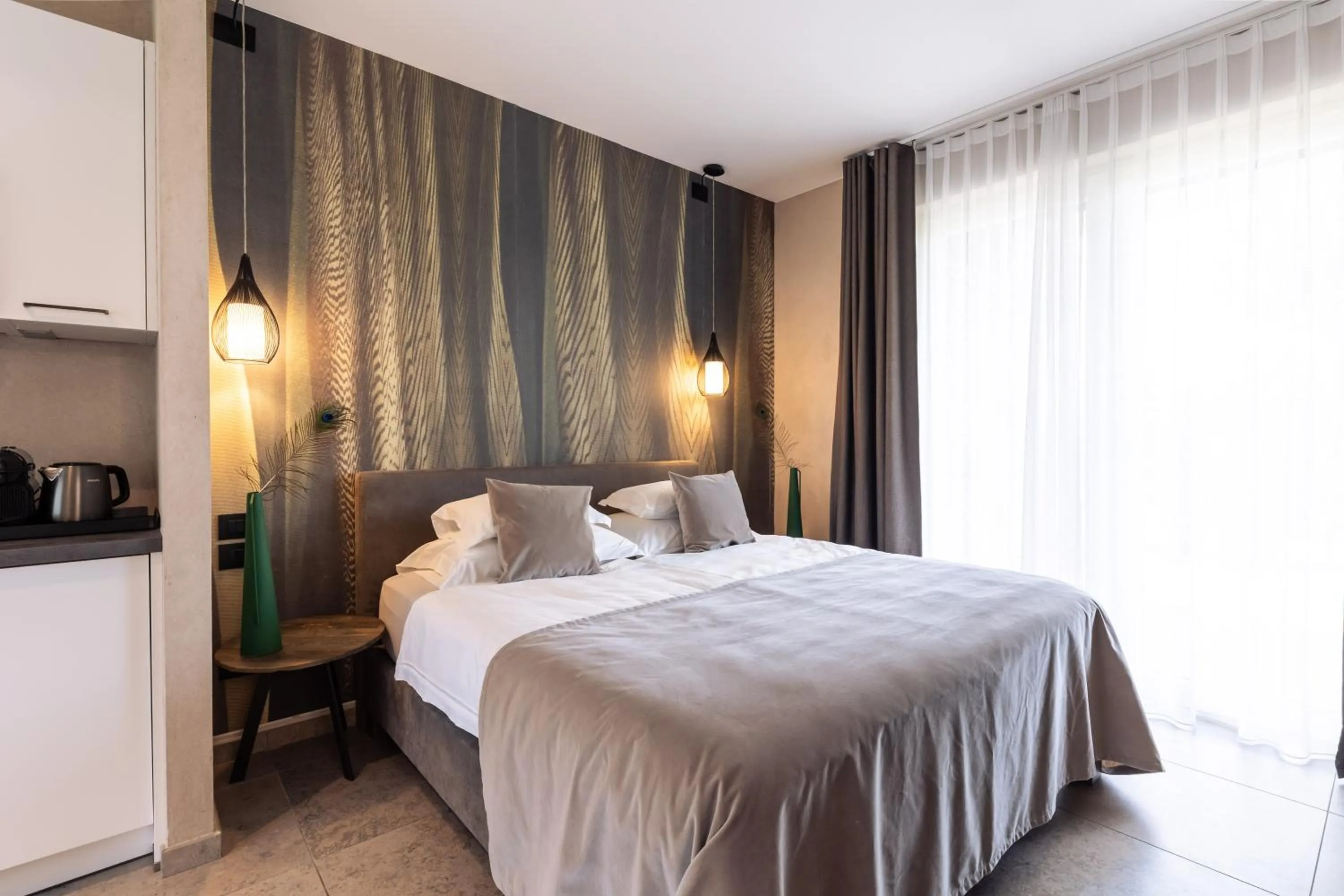 Bed in Quellenhof Luxury Resort Lazise