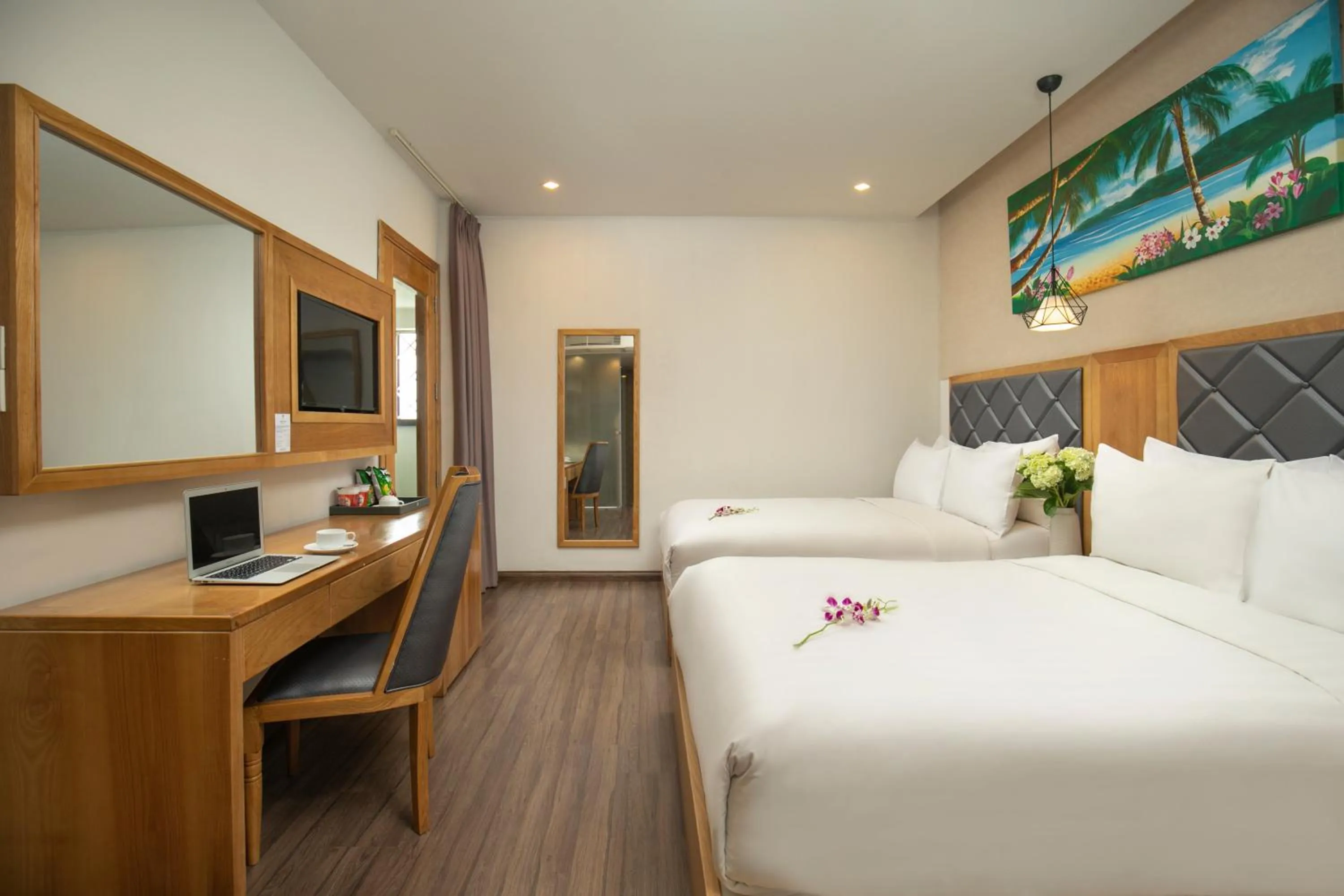 Living room, Bed in Grand Sunrise Boutique Hotel