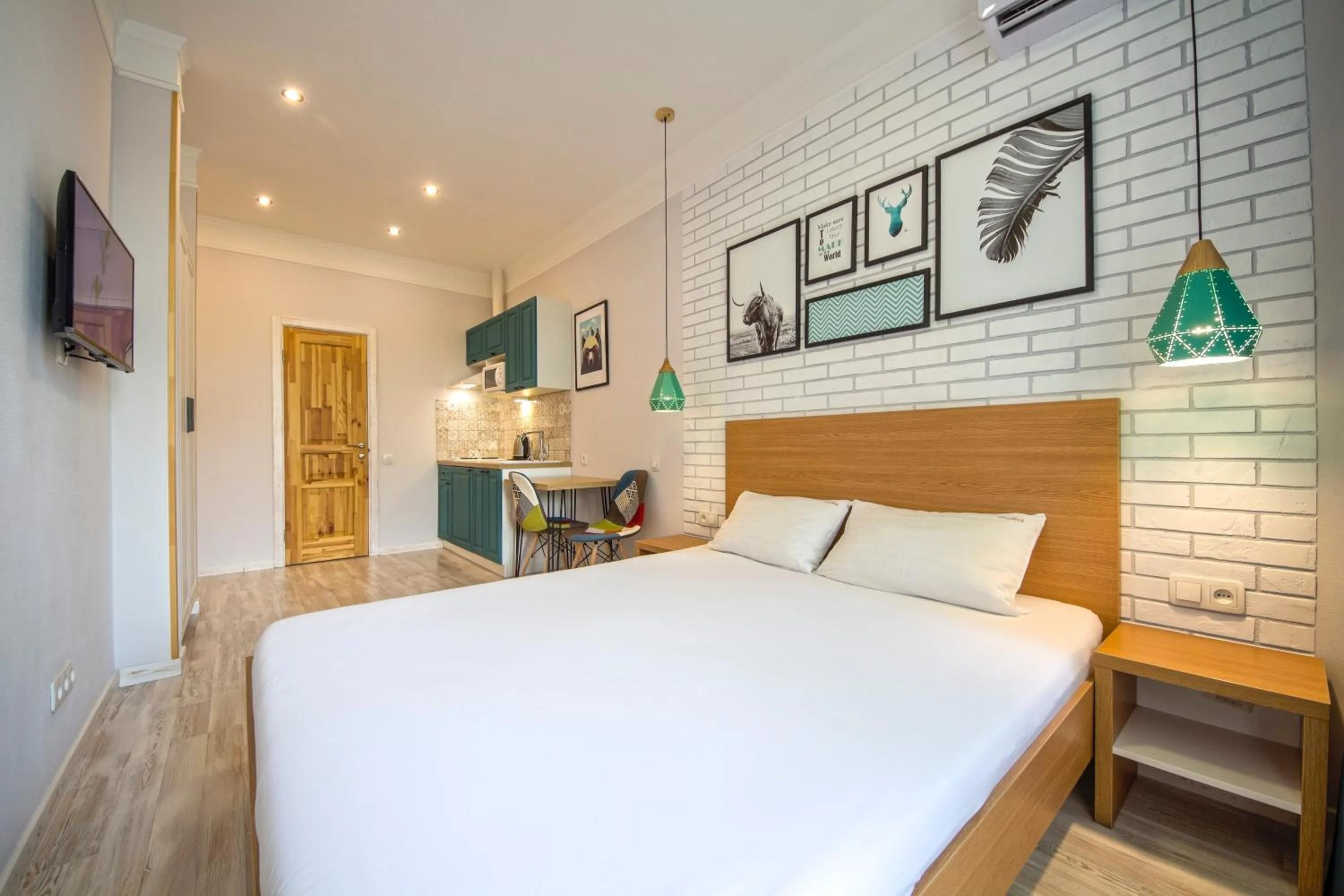 Bed in Idea Design Apart-Hotel