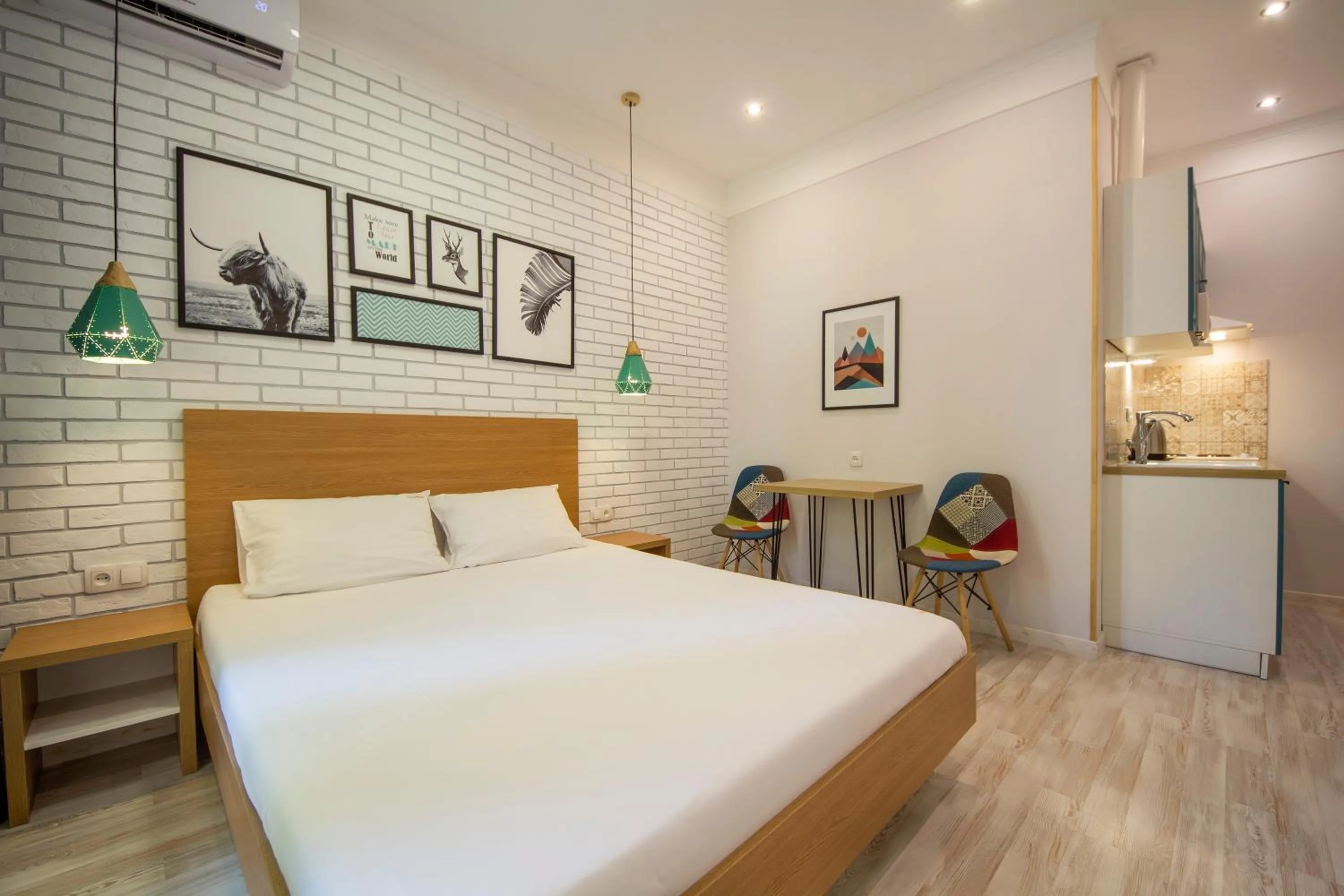 Dining area, Bed in Idea Design Apart-Hotel