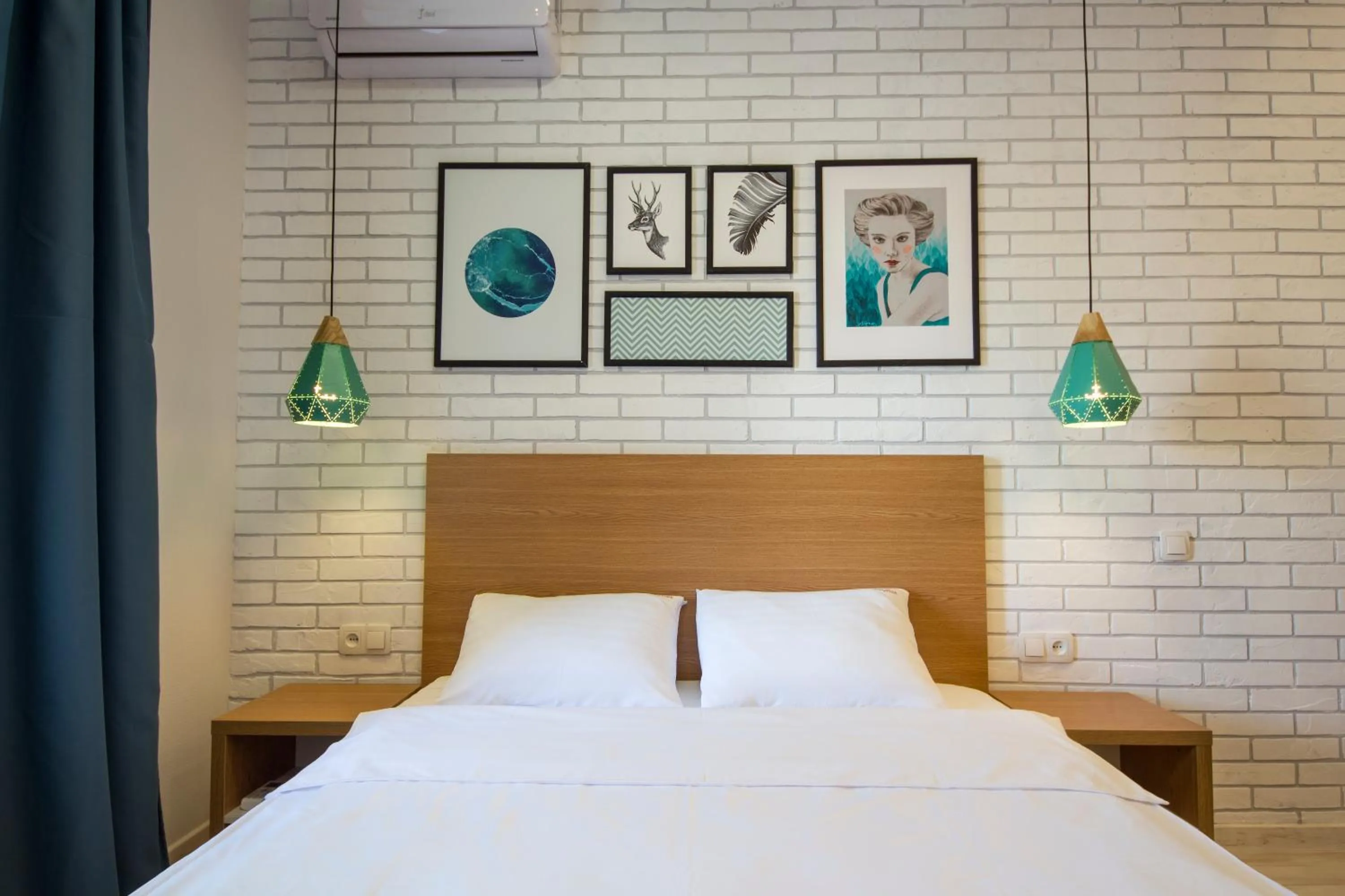 Bed in Idea Design Apart-Hotel