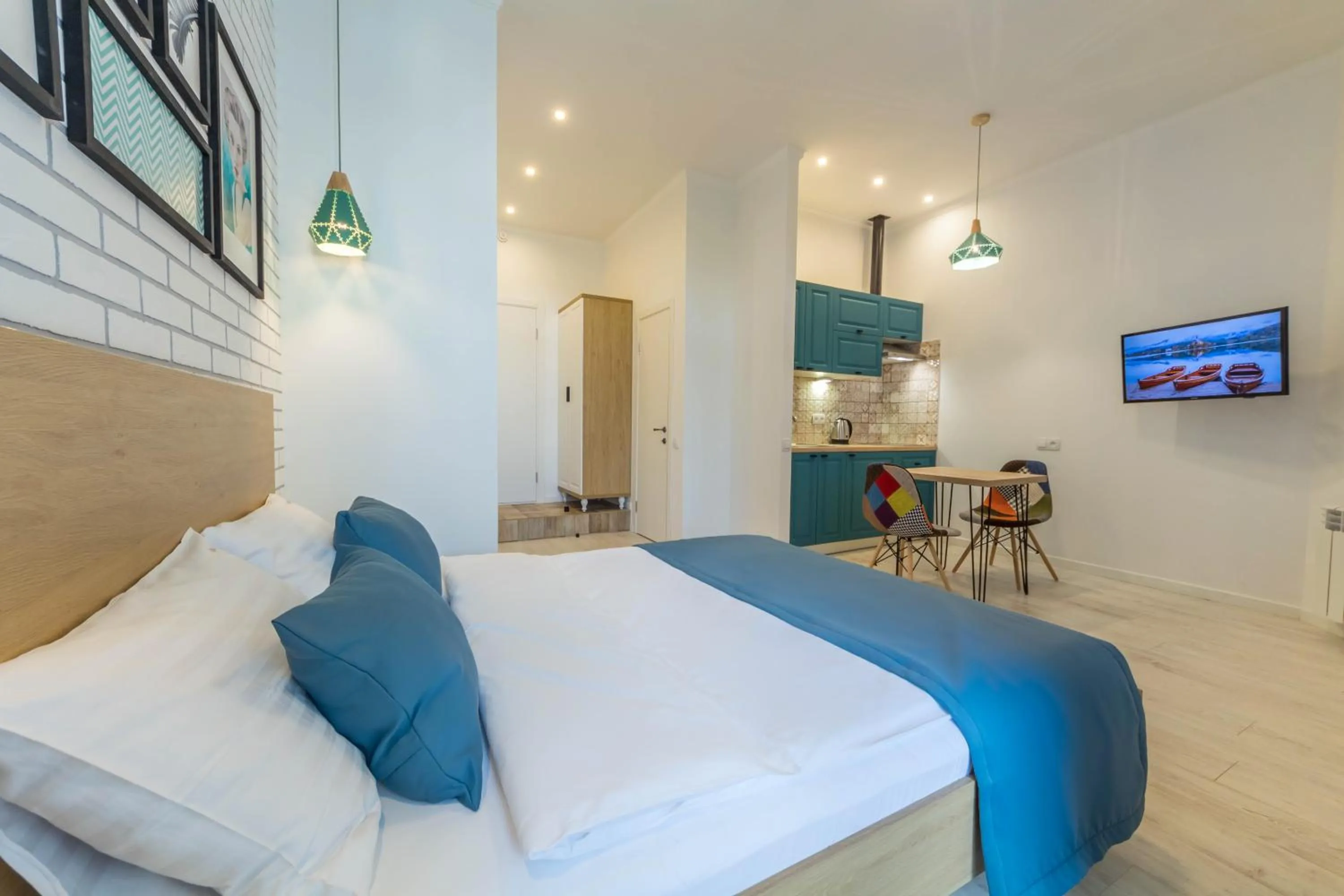 Bed in Idea Design Apart-Hotel