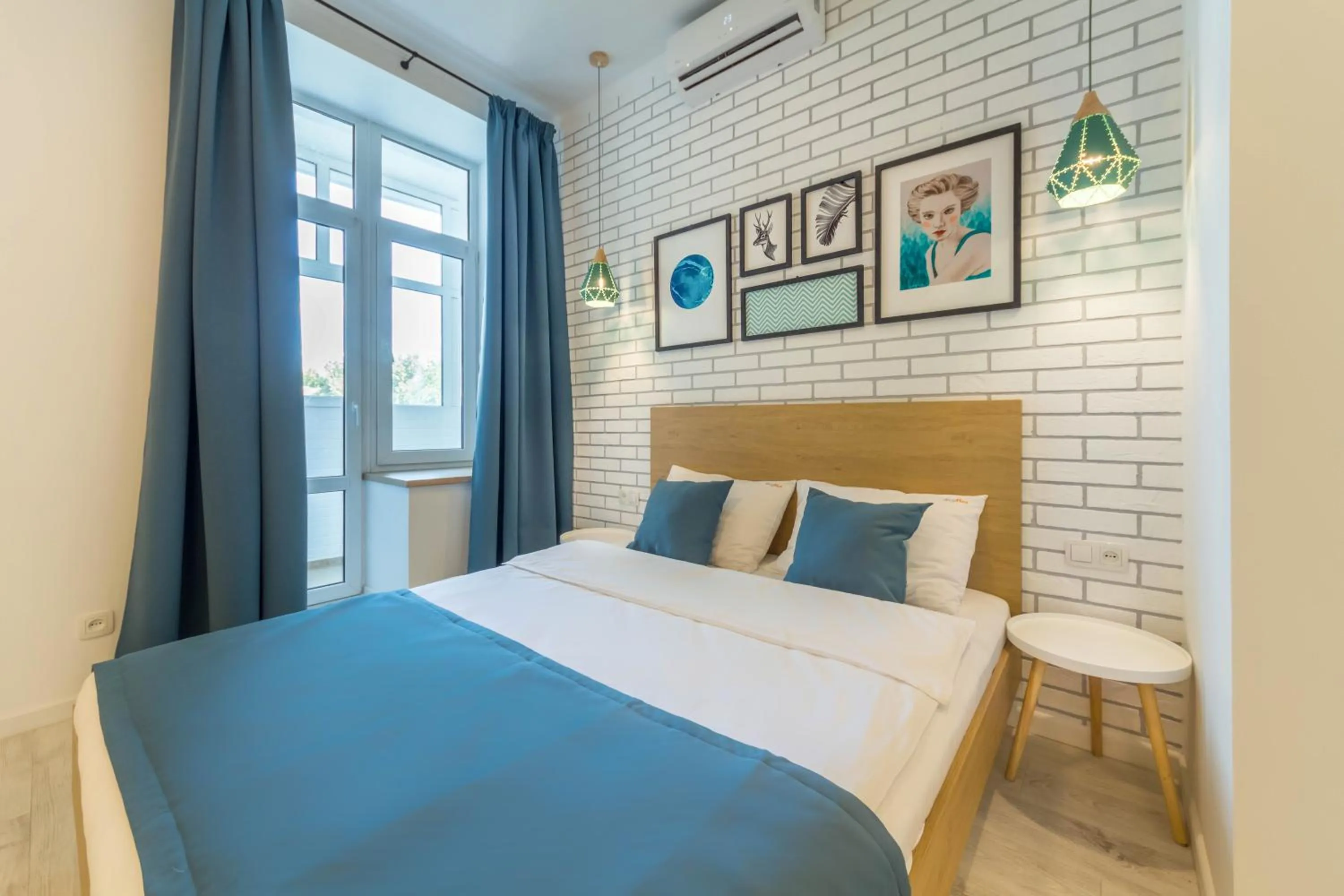 Bed in Idea Design Apart-Hotel