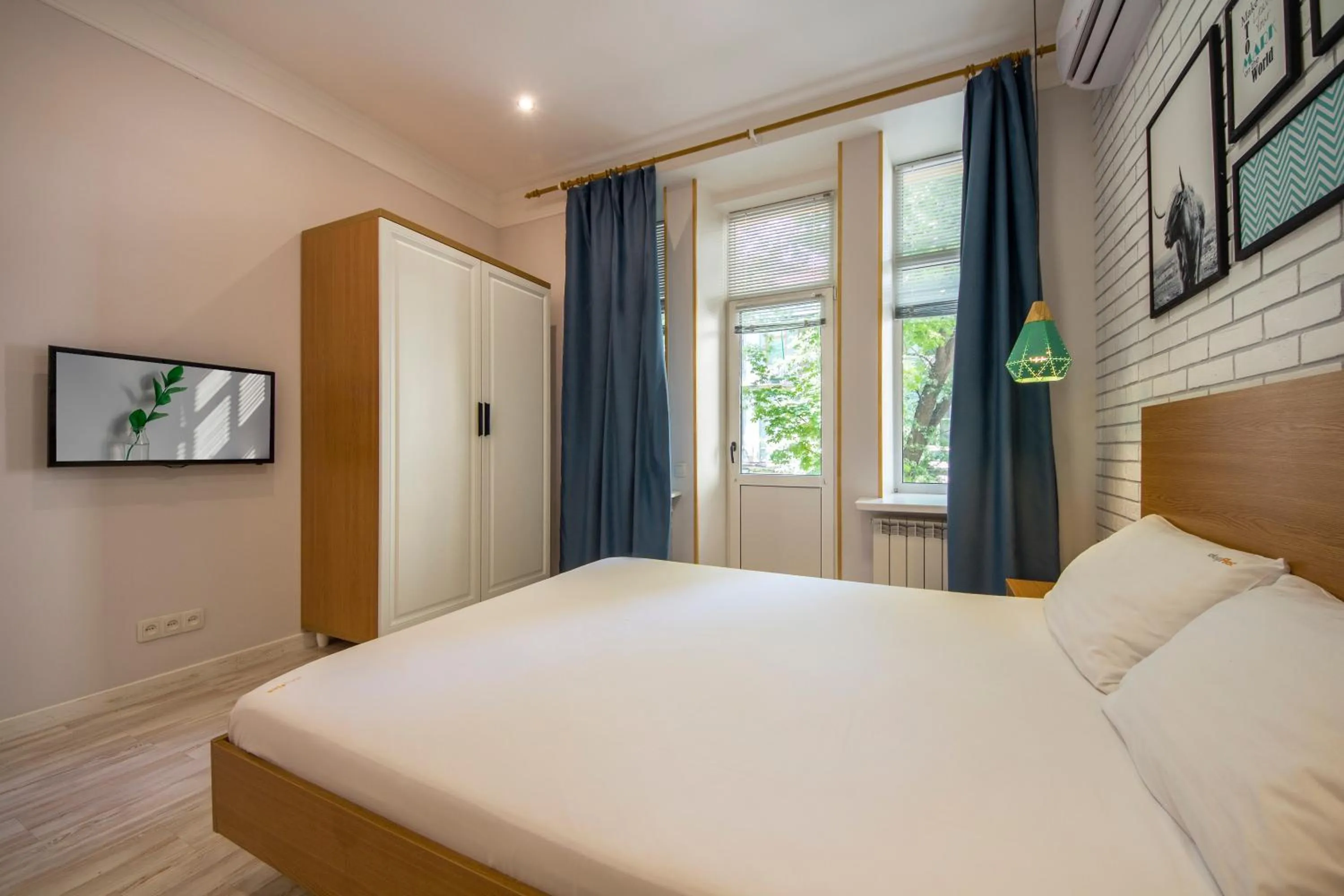 Bed in Idea Design Apart-Hotel