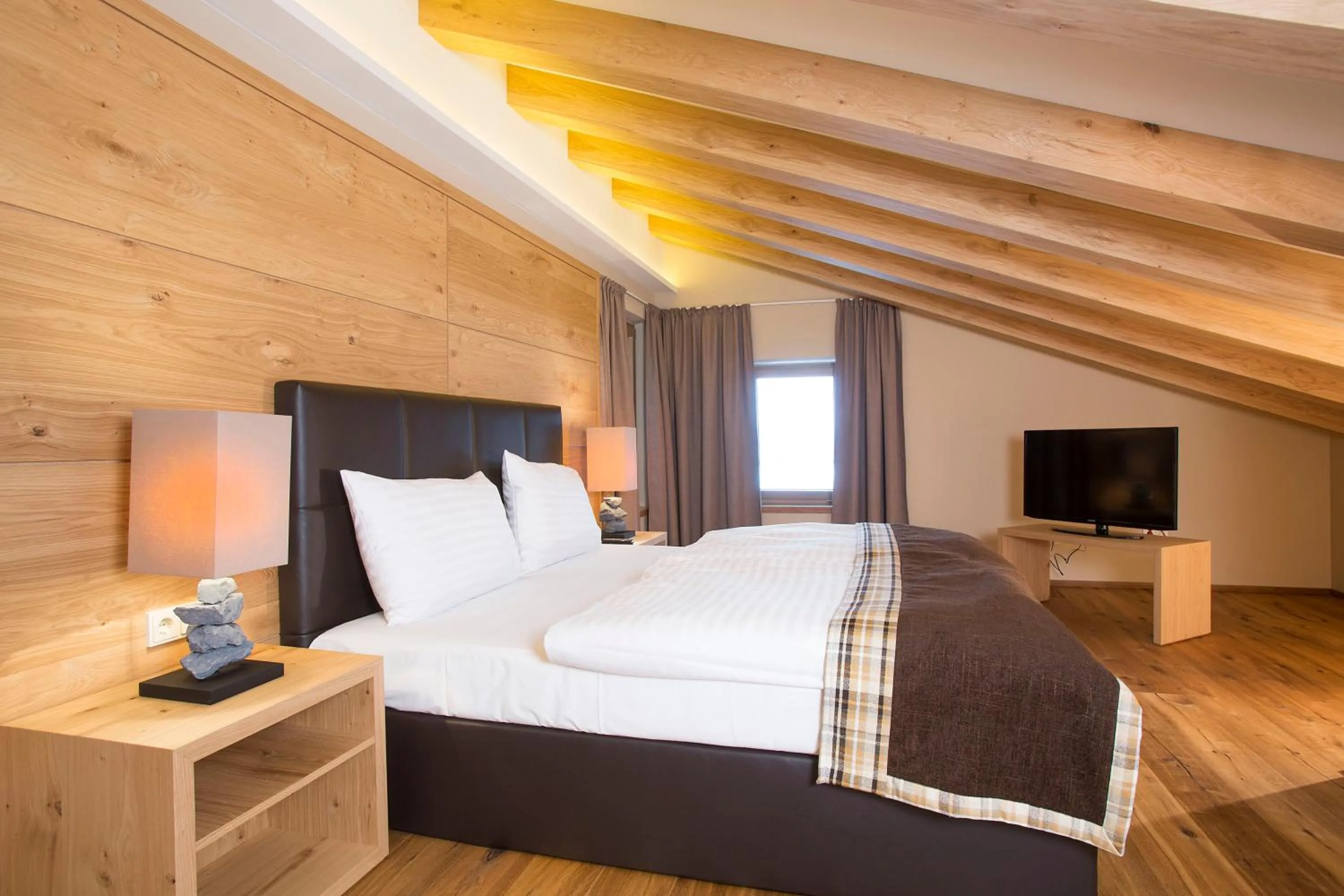 Property building, Bed in Das gemütliche Dorfhotel Kaltenhauser