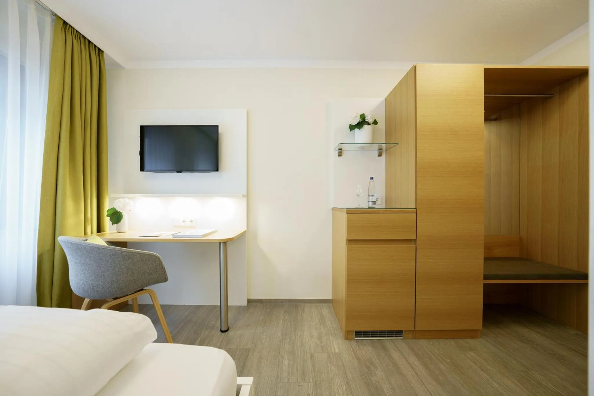 Seating area, Bed in Hotel Hiller in Abstatt