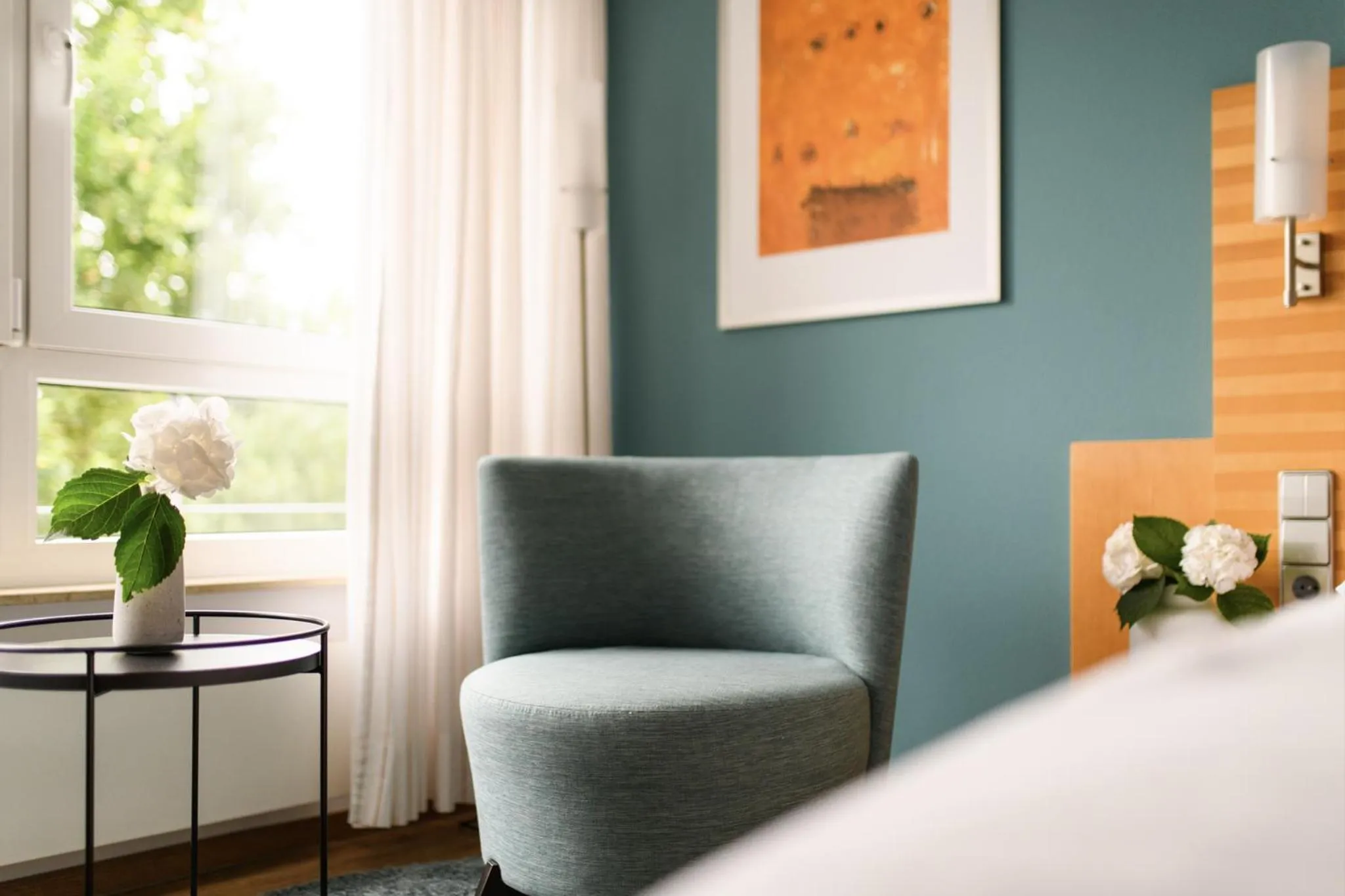 Seating area, Bed in Hotel Hiller in Abstatt