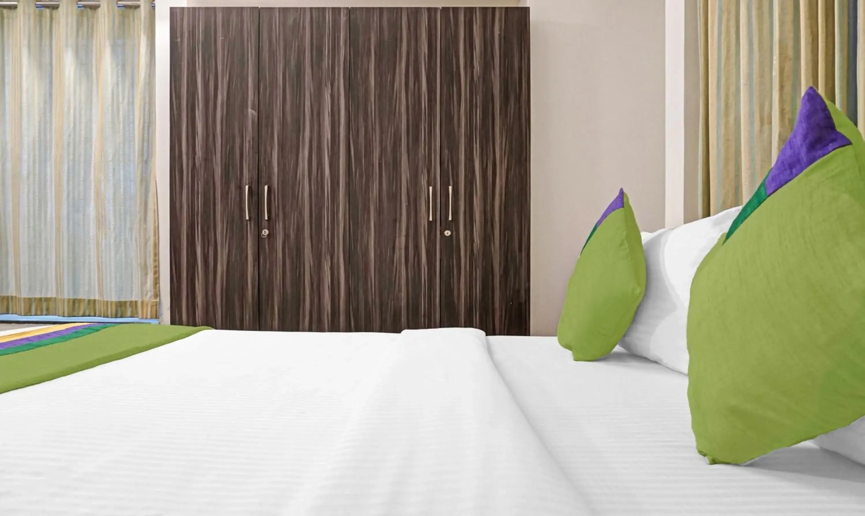 Bedroom, Bed in Treebo Diamond Residency - DDPK Inn Bedroom, Bed in Treebo Diamond Residency - DDPK Inn