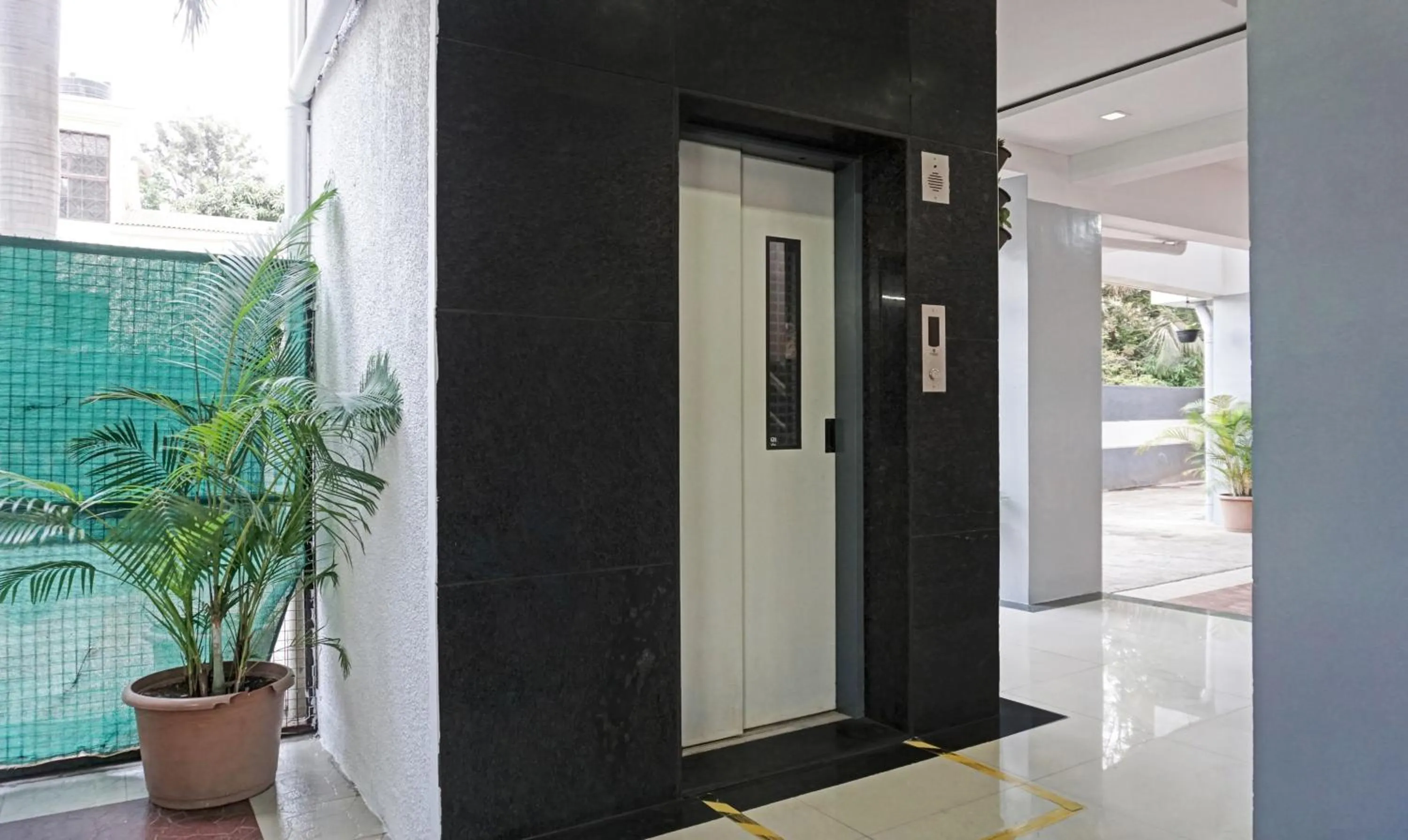 elevator in Treebo Diamond Residency - DDPK Inn