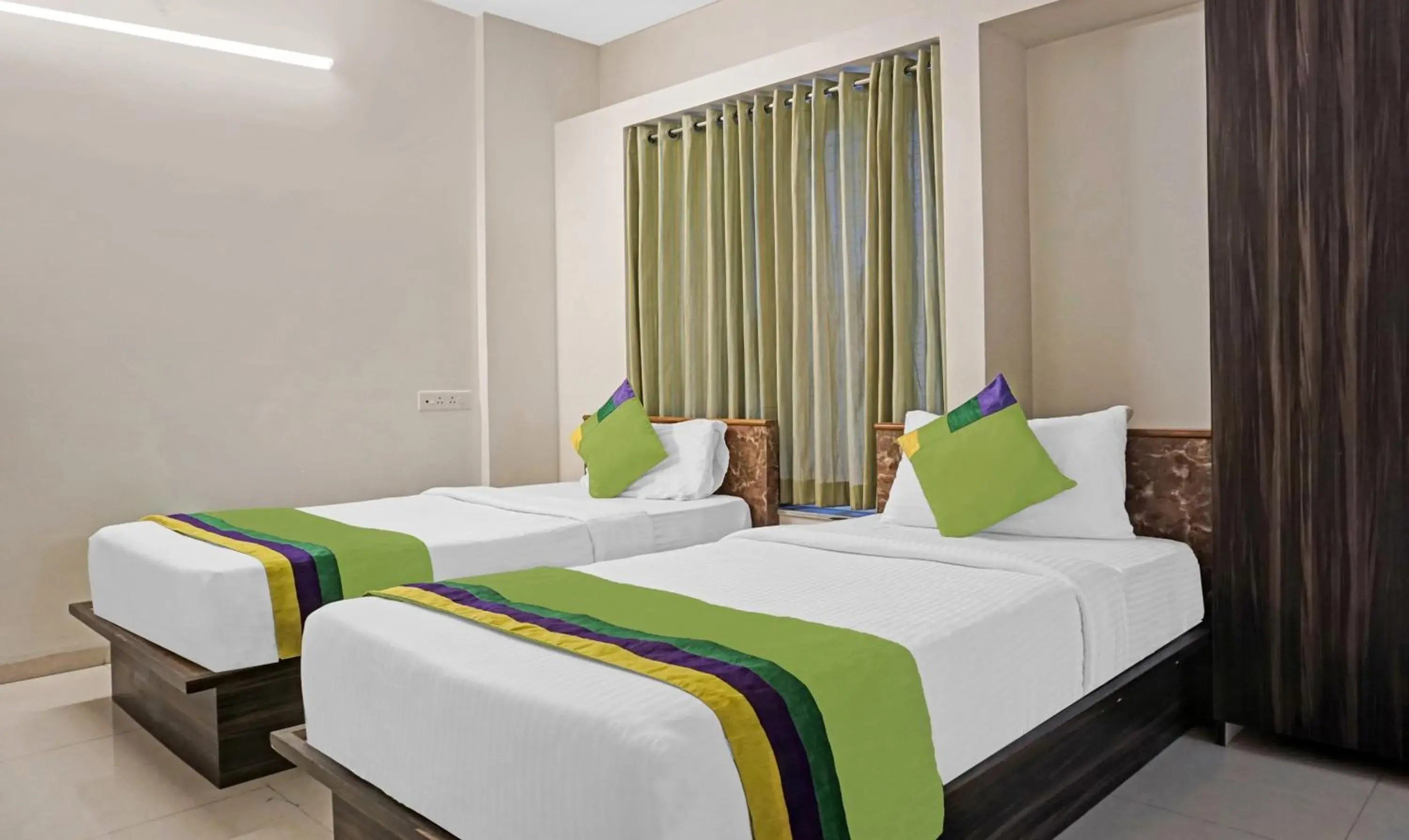 Bedroom, Bed in Treebo Diamond Residency - DDPK Inn Bedroom, Bed in Treebo Diamond Residency - DDPK Inn