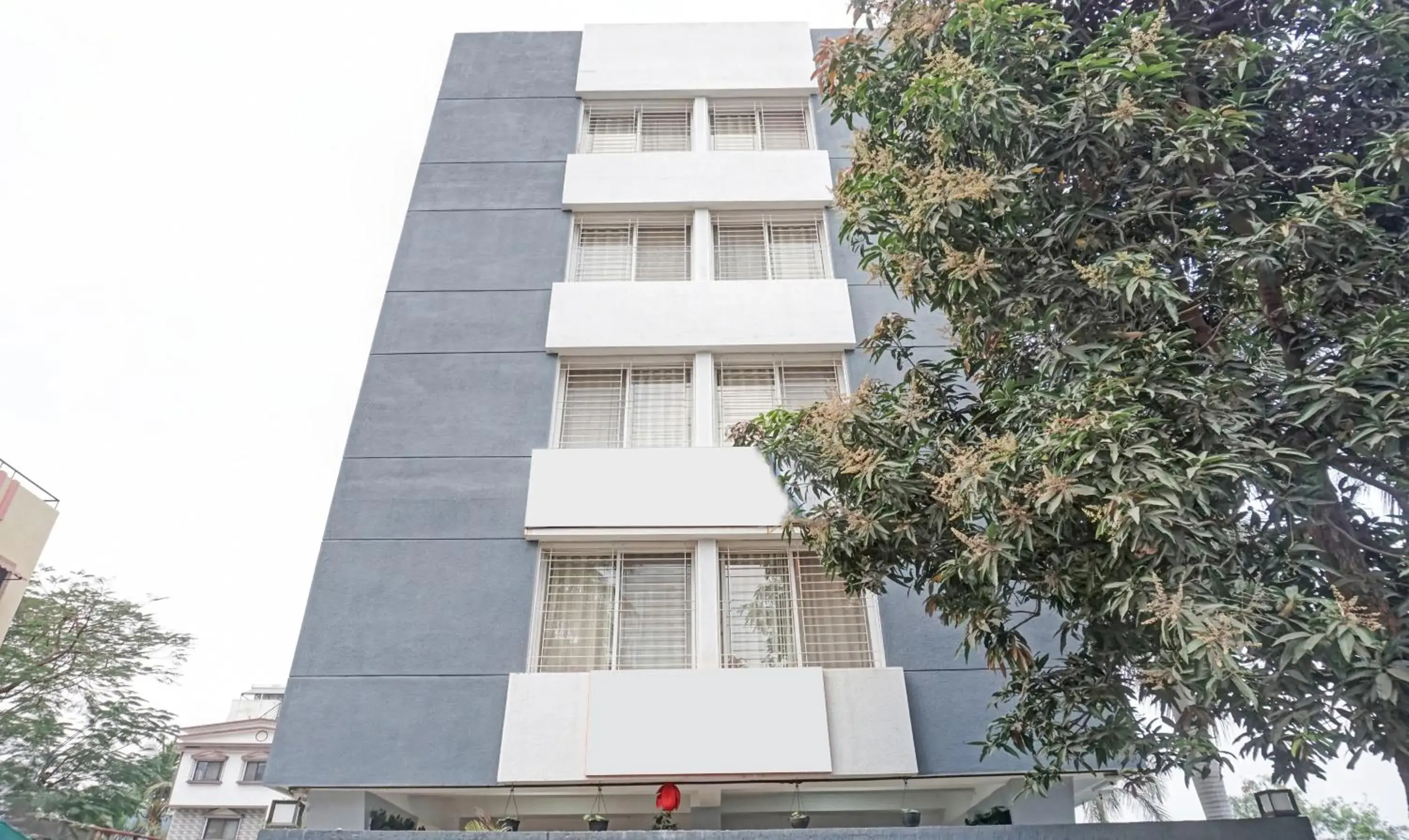 Property building in Treebo Diamond Residency - DDPK Inn Property building in Treebo Diamond Residency - DDPK Inn