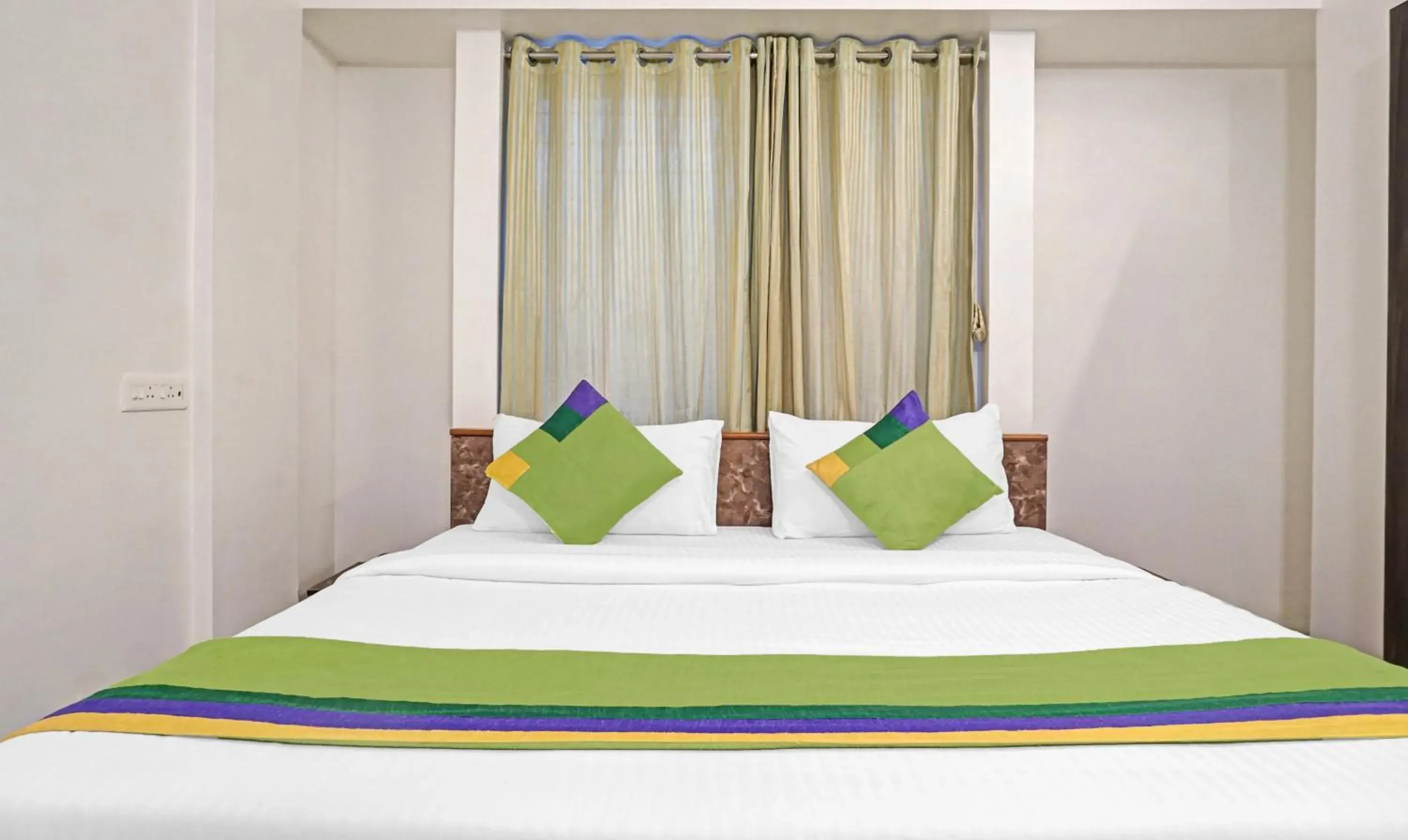 Bedroom, Bed in Treebo Diamond Residency - DDPK Inn Bedroom, Bed in Treebo Diamond Residency - DDPK Inn