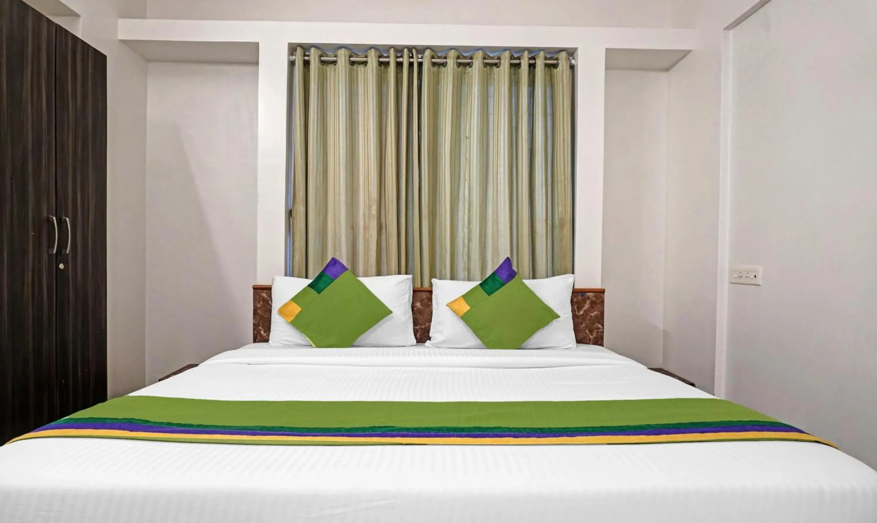 Bedroom, Bed in Treebo Diamond Residency - DDPK Inn Bedroom, Bed in Treebo Diamond Residency - DDPK Inn