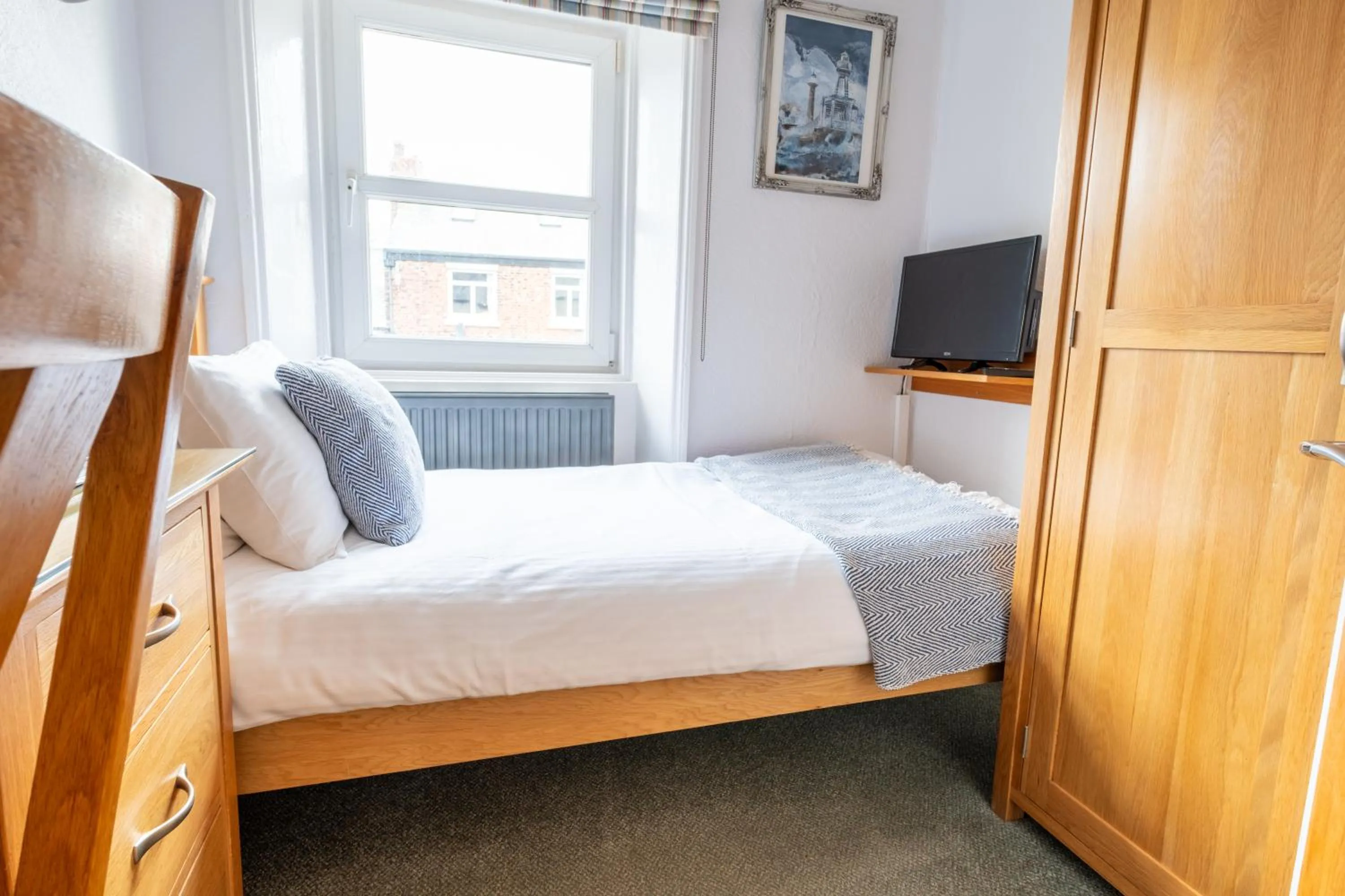 Photo of the whole room, Bed in Number 7 Guest House