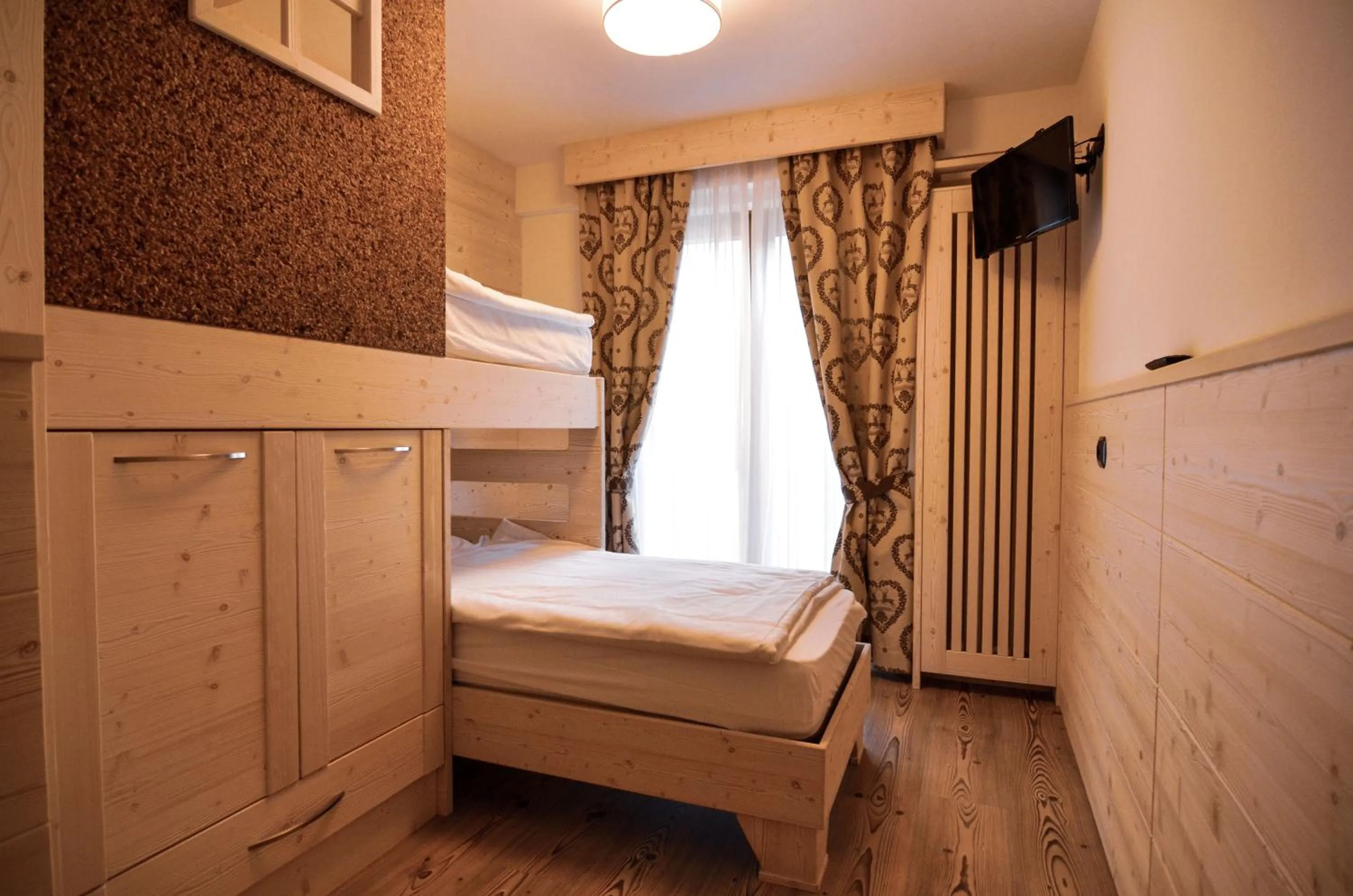 Bed in Hotel Cristallo