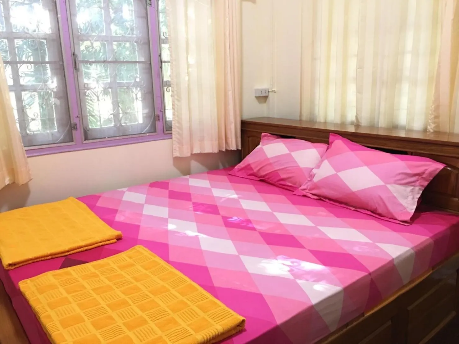 Bed in นาหินลาดรีสอร์ท Nahinlad Resort