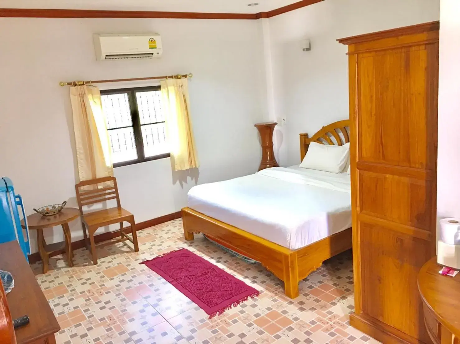 Bed in นาหินลาดรีสอร์ท Nahinlad Resort Bed in นาหินลาดรีสอร์ท Nahinlad Resort