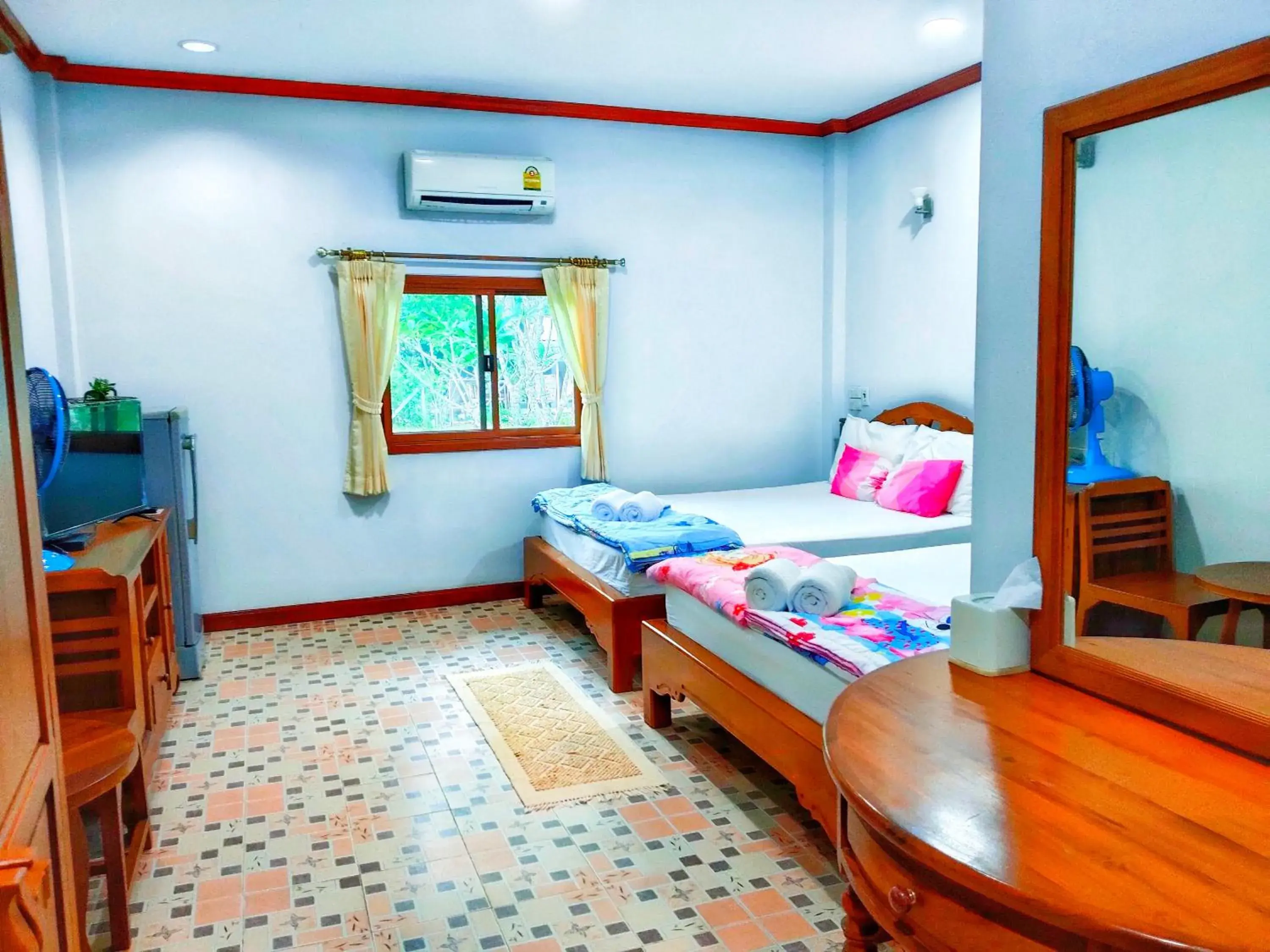 Bed in นาหินลาดรีสอร์ท Nahinlad Resort Bed in นาหินลาดรีสอร์ท Nahinlad Resort