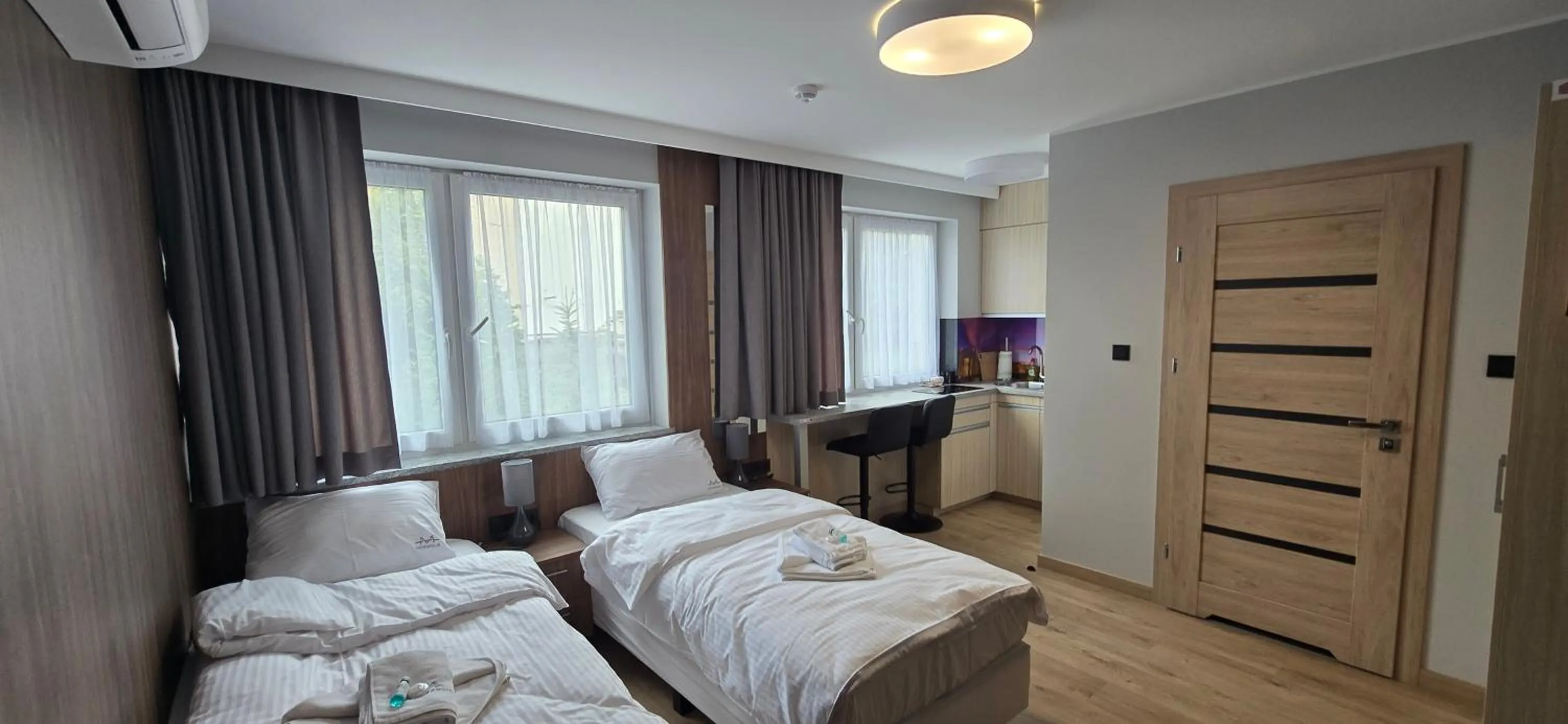 Photo of the whole room, Bed in Metropolis Apartamenty Centrum