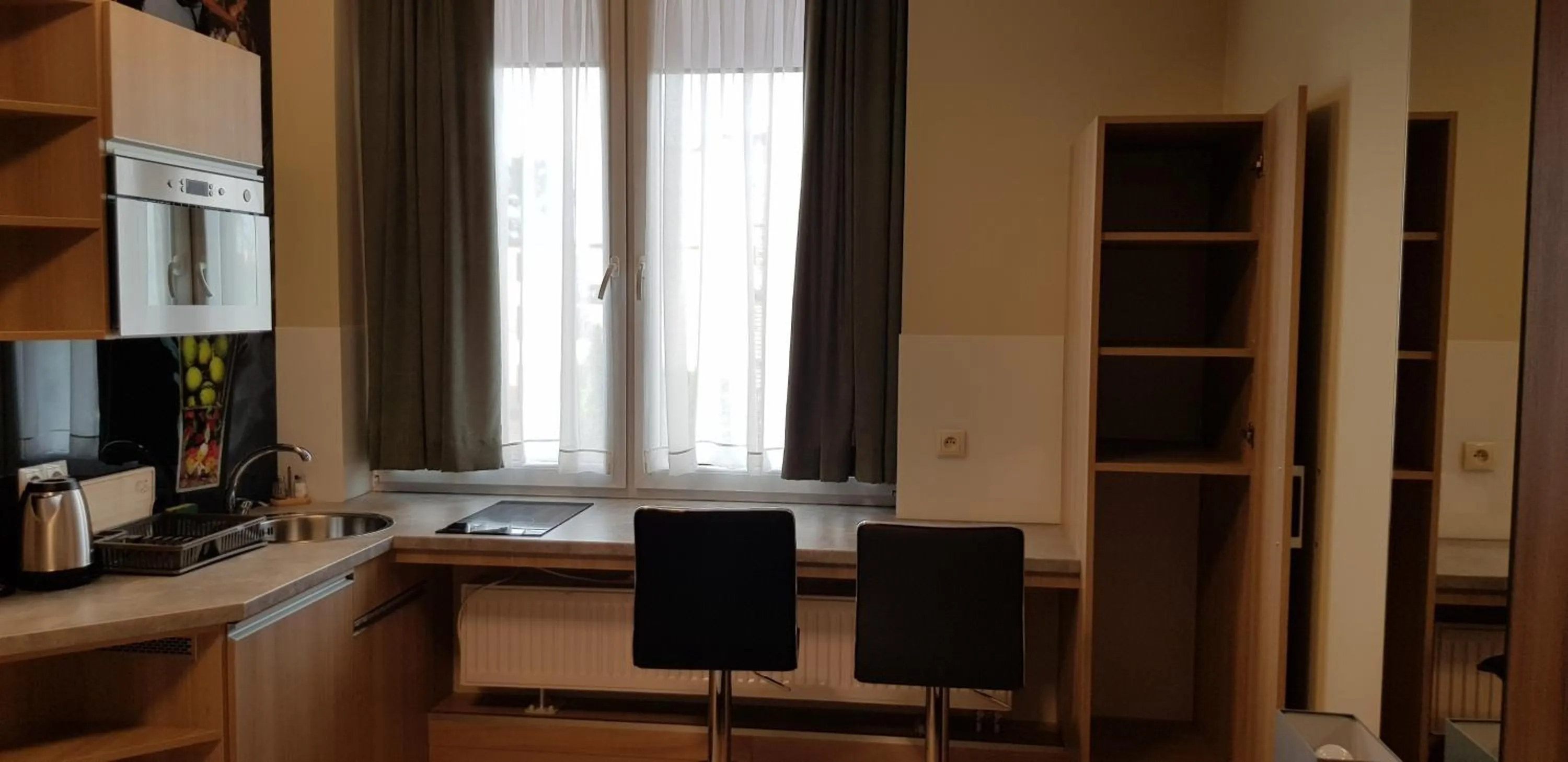 Kitchen or kitchenette in Metropolis Apartamenty Centrum