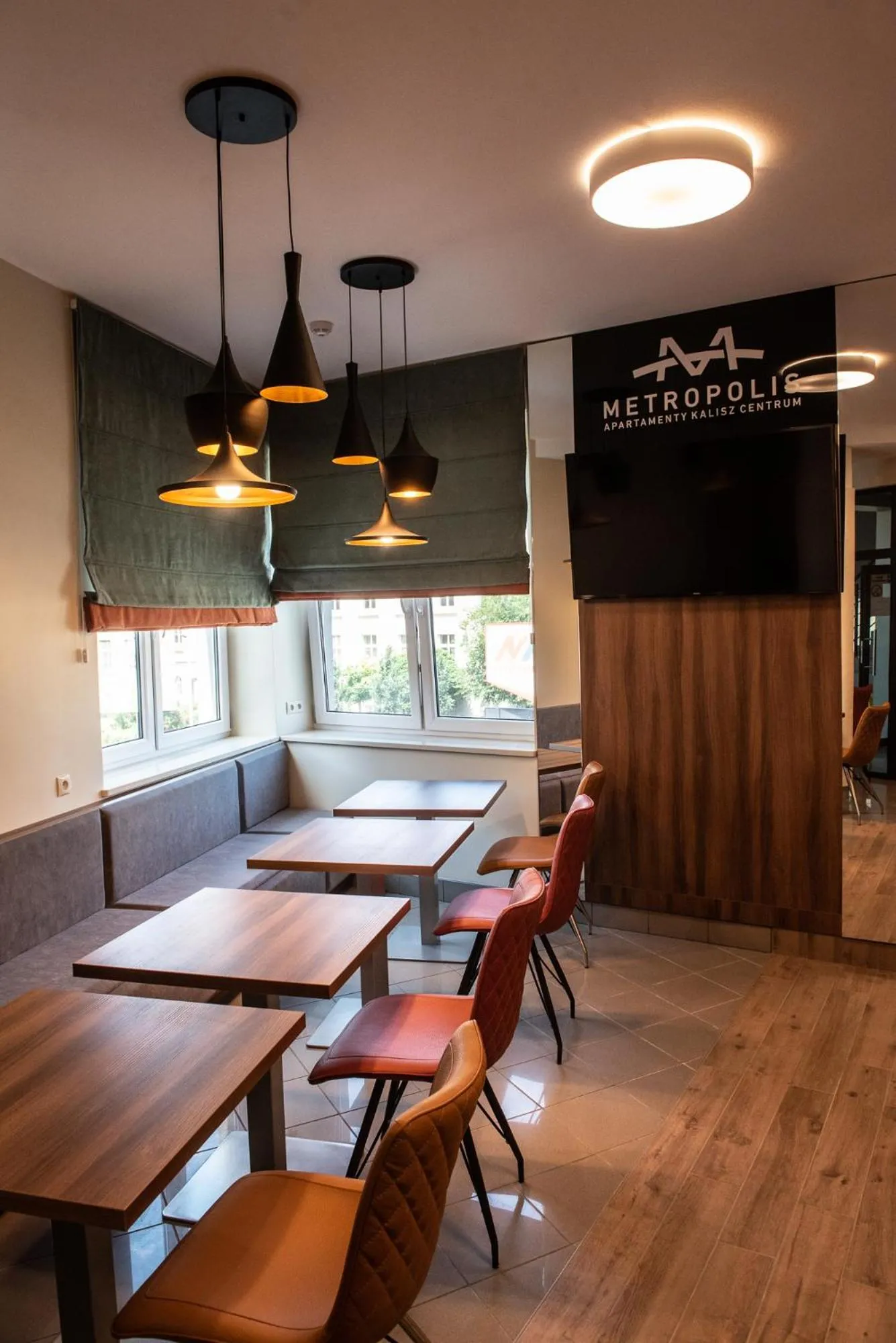 Communal lounge/ TV room in Metropolis Apartamenty Centrum