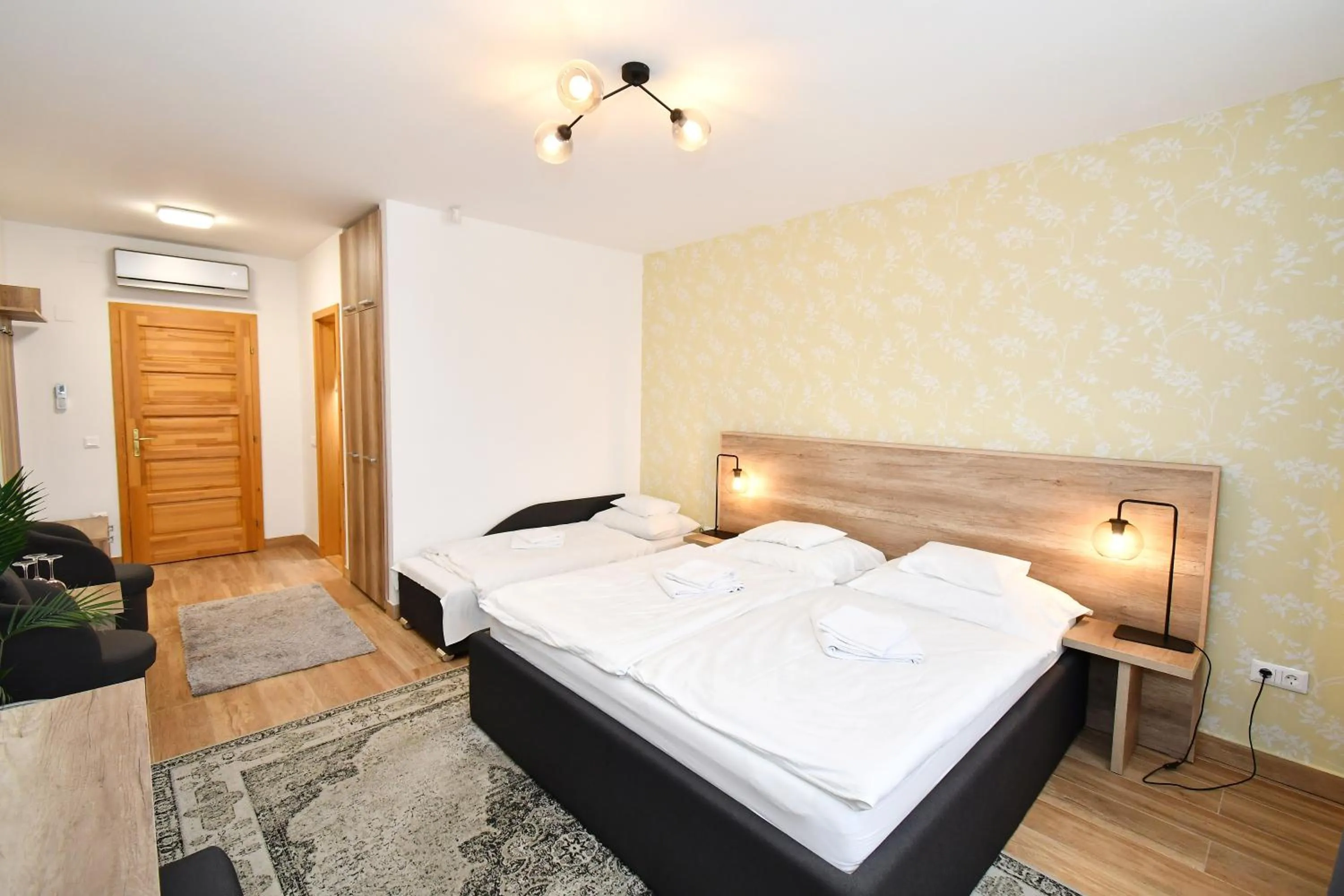 Photo of the whole room, Bed in Angyal Borászat és Panzió