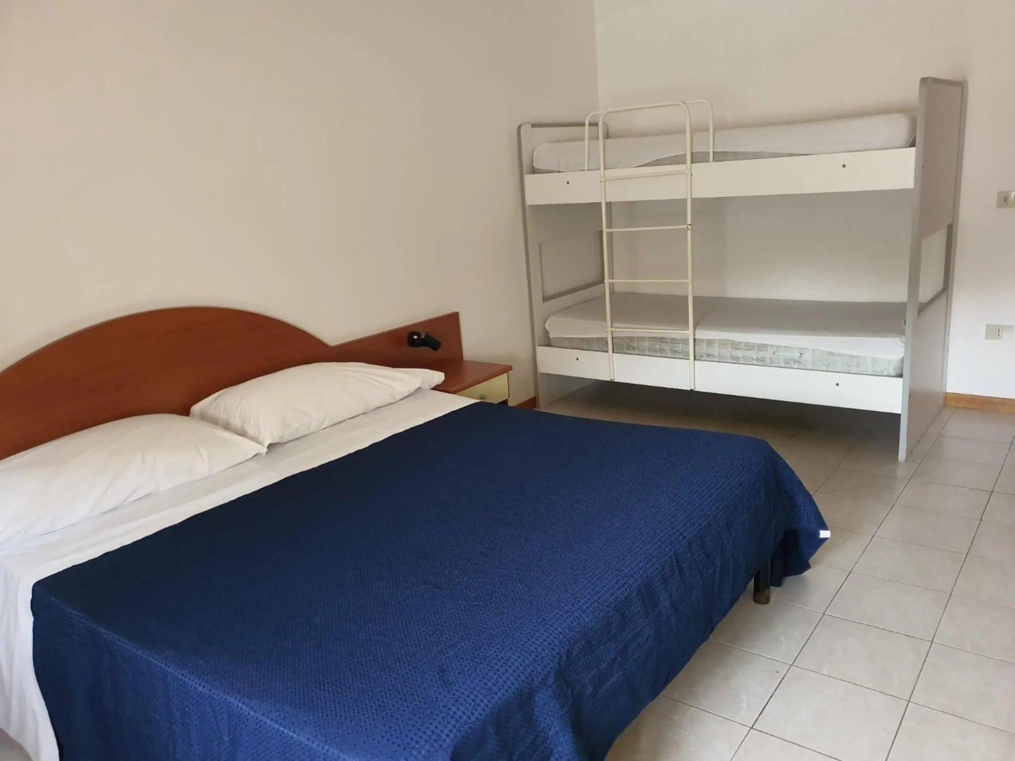 Bedroom in Villaggio Hotel Club La Pace