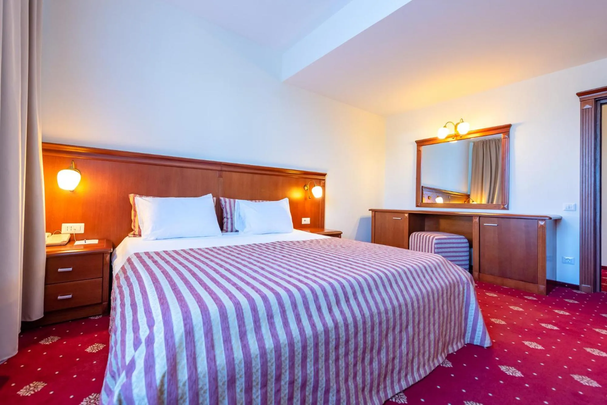 Bed in Hotel Minerva