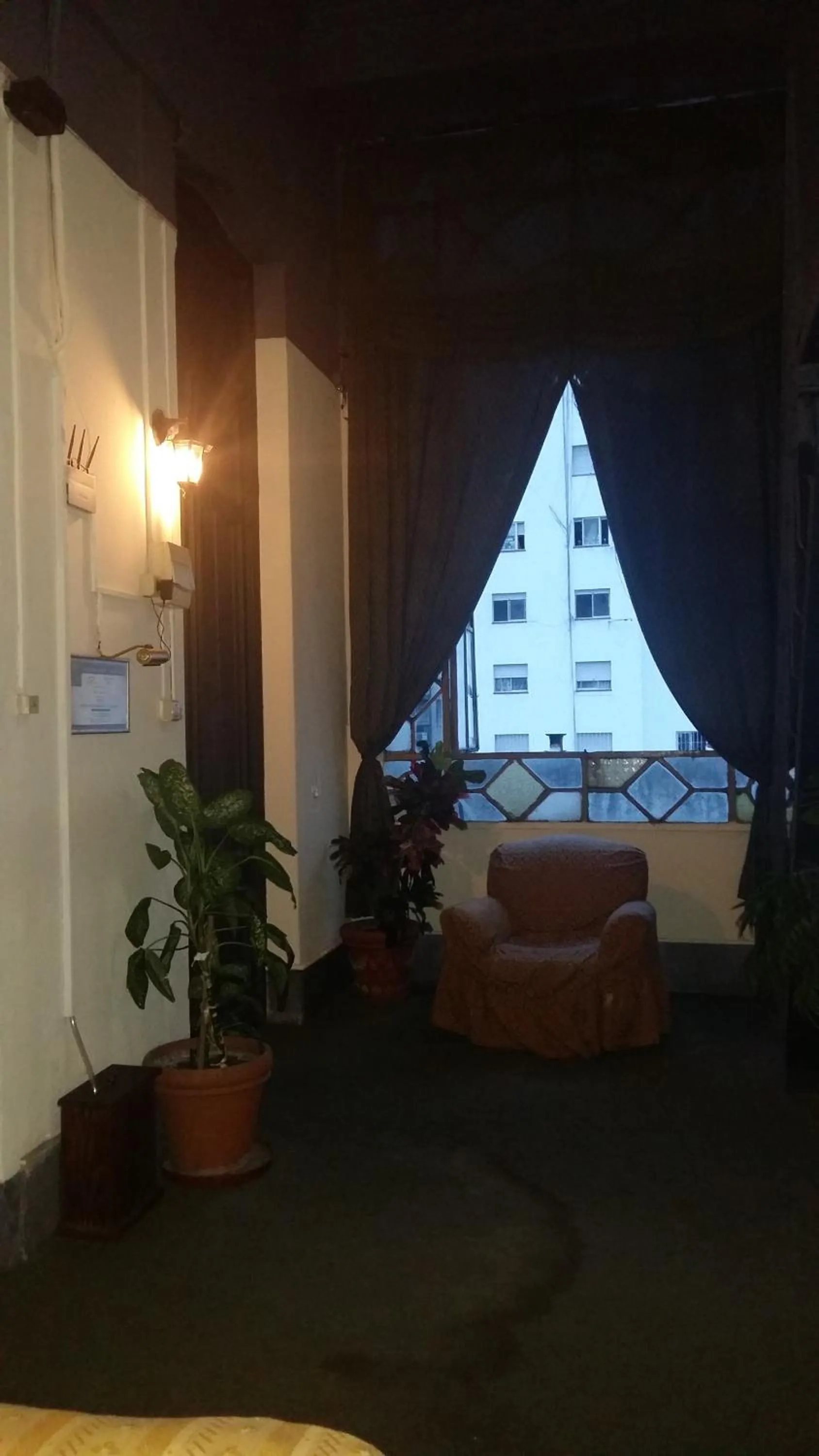 Living room, Bed in Hotel Uruguay