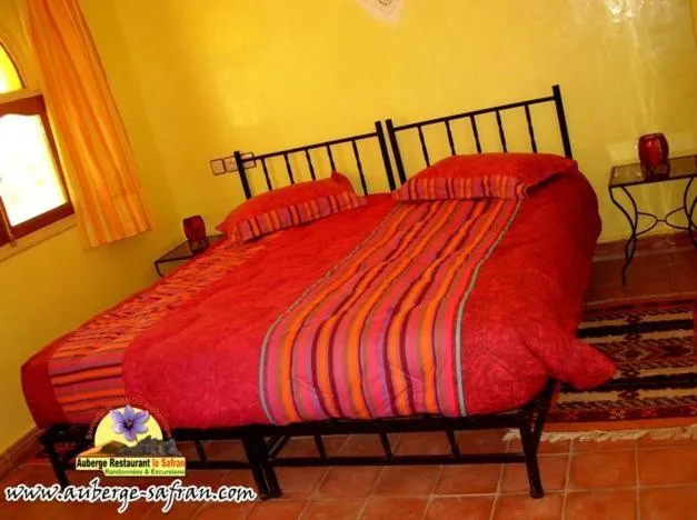 Photo of the whole room, Bed in Auberge Restaurant le Safran