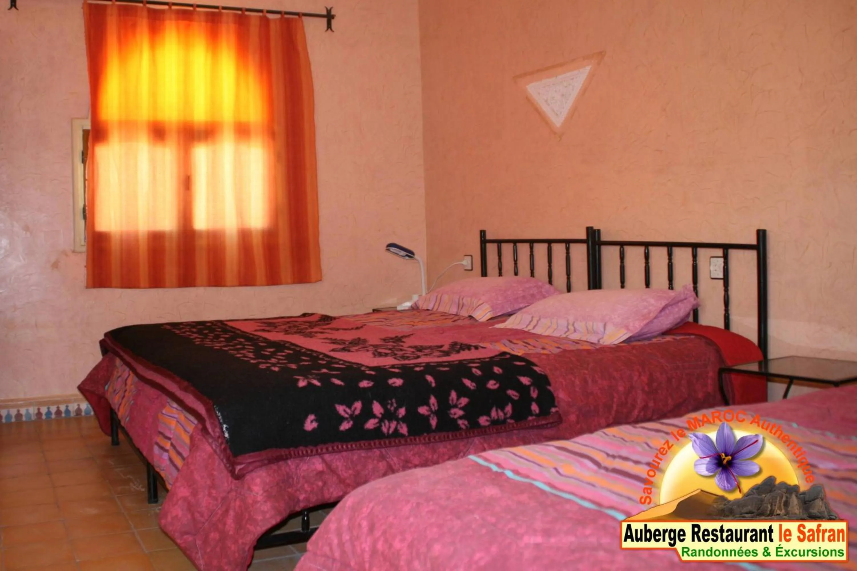 Photo of the whole room, Bed in Auberge Restaurant le Safran