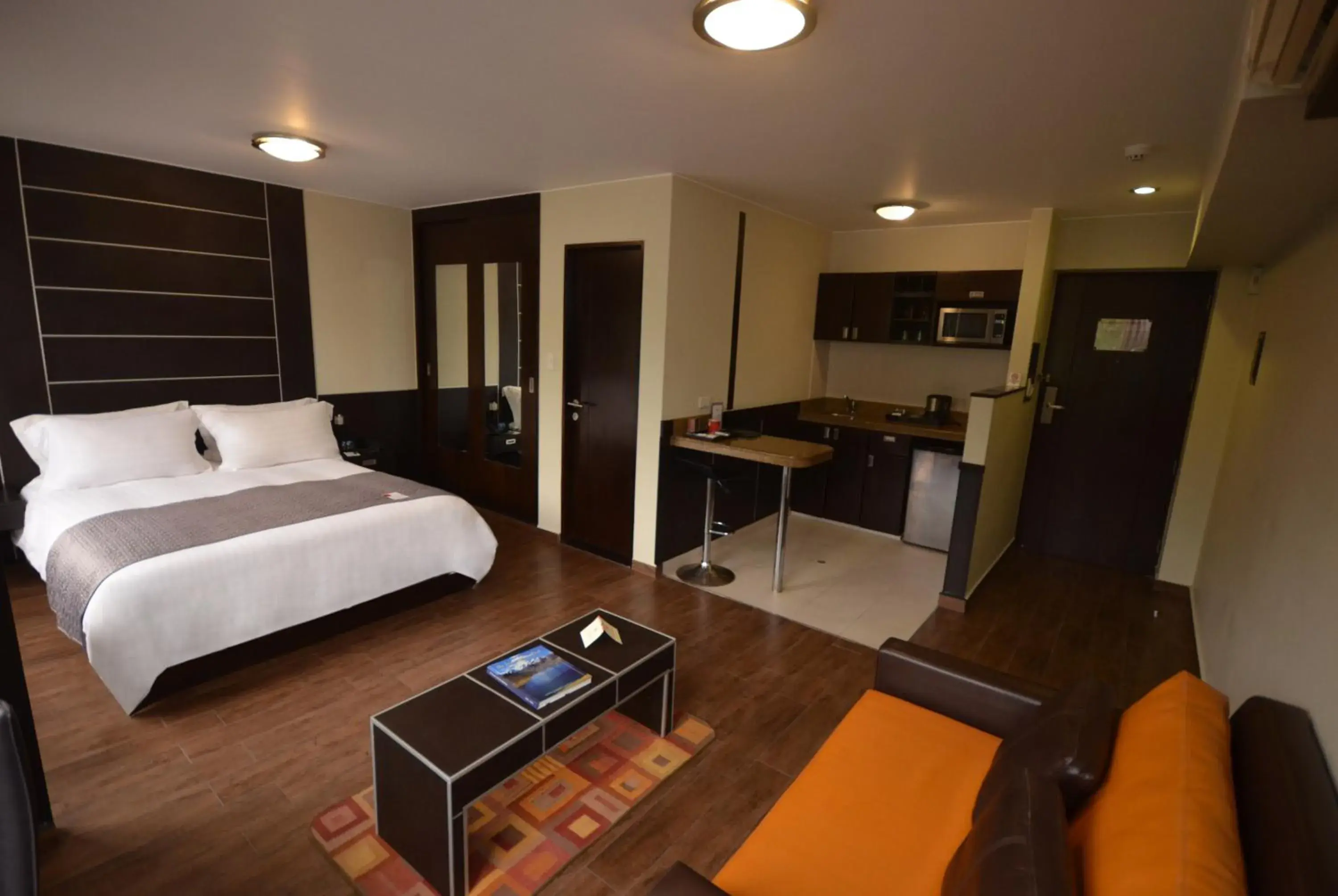 Living room, Bed in qp Hotels Lima Living room, Bed in qp Hotels Lima