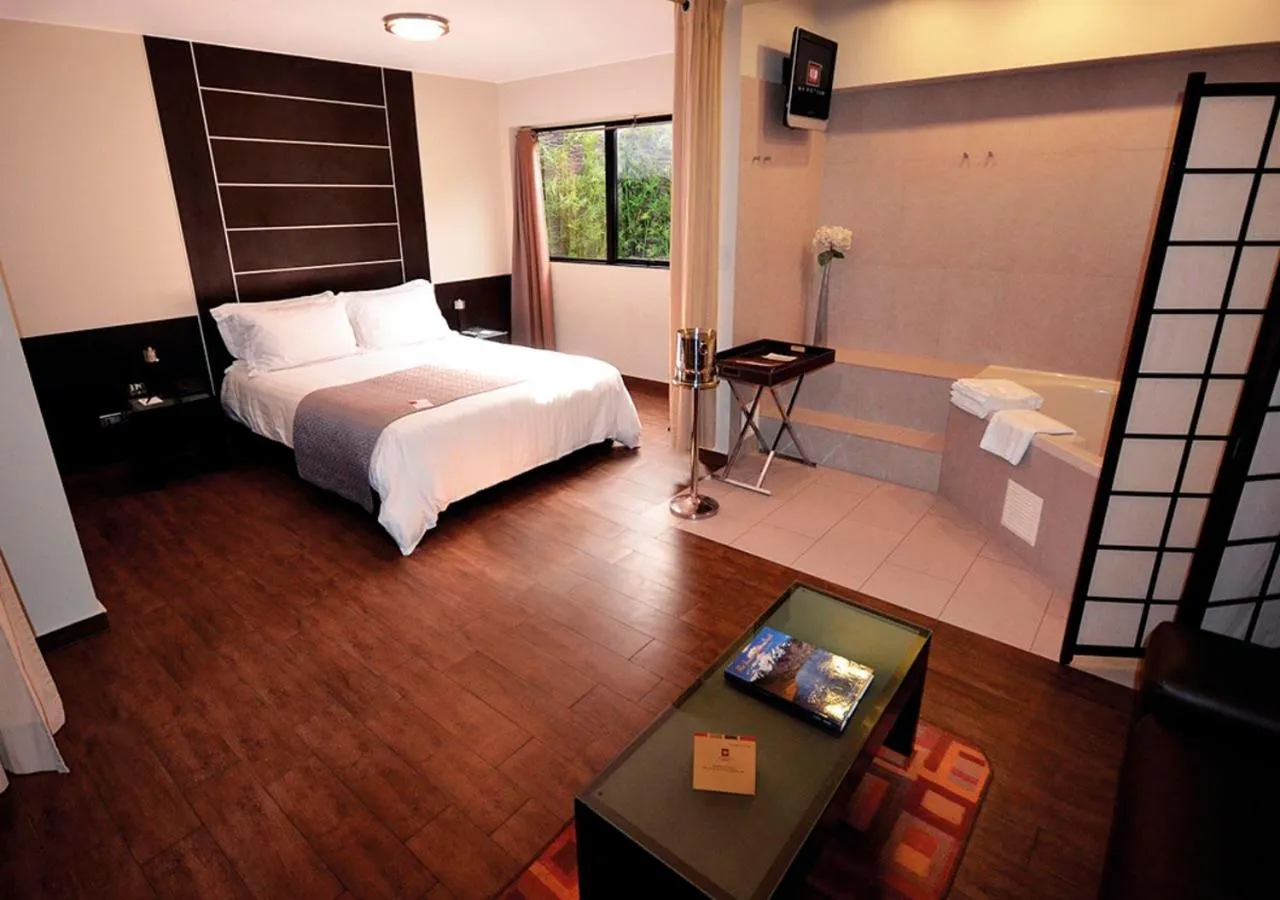 Photo of the whole room, Bed in qp Hotels Lima