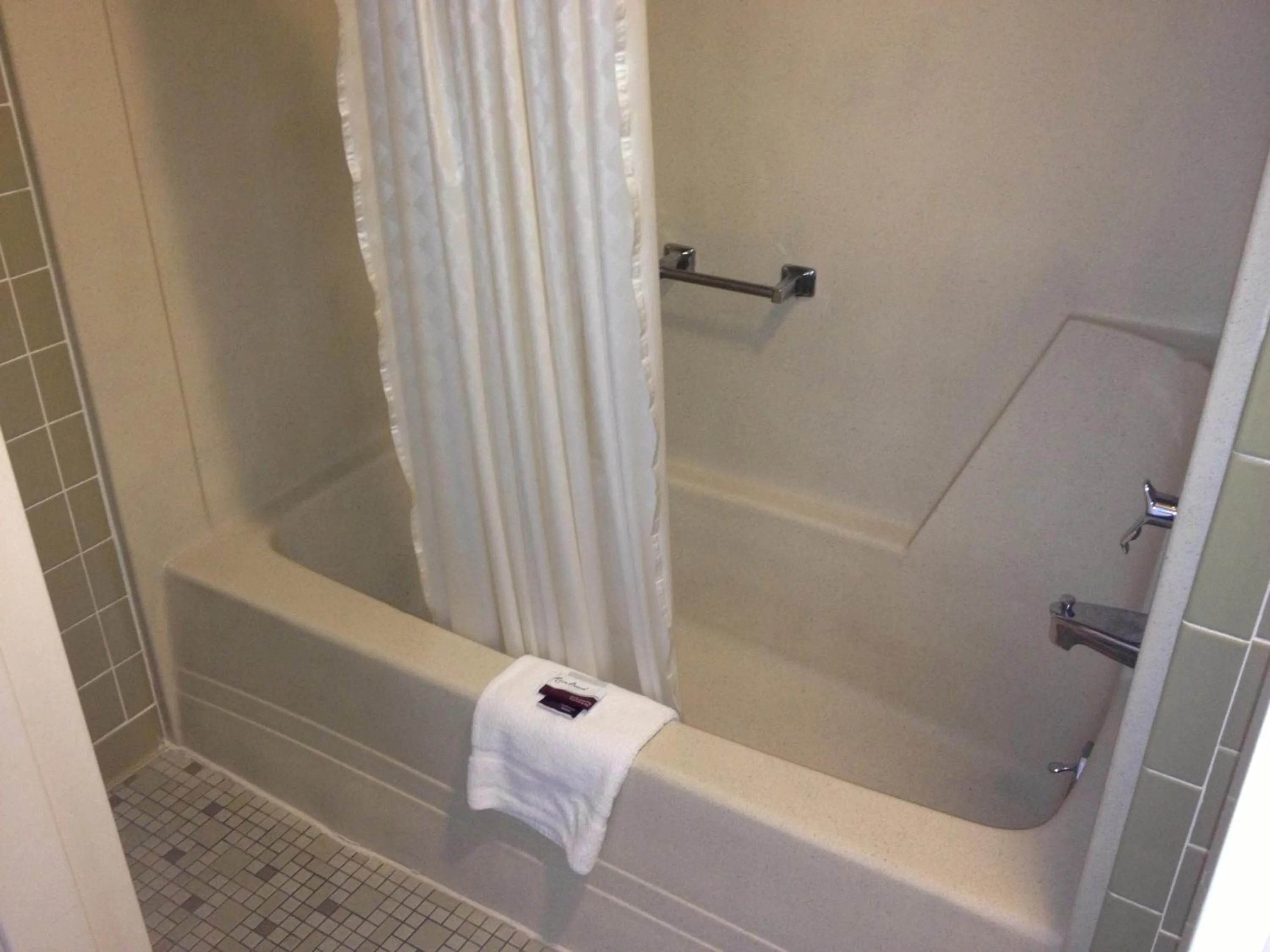 Bathroom in Family Budget Inn Harrison