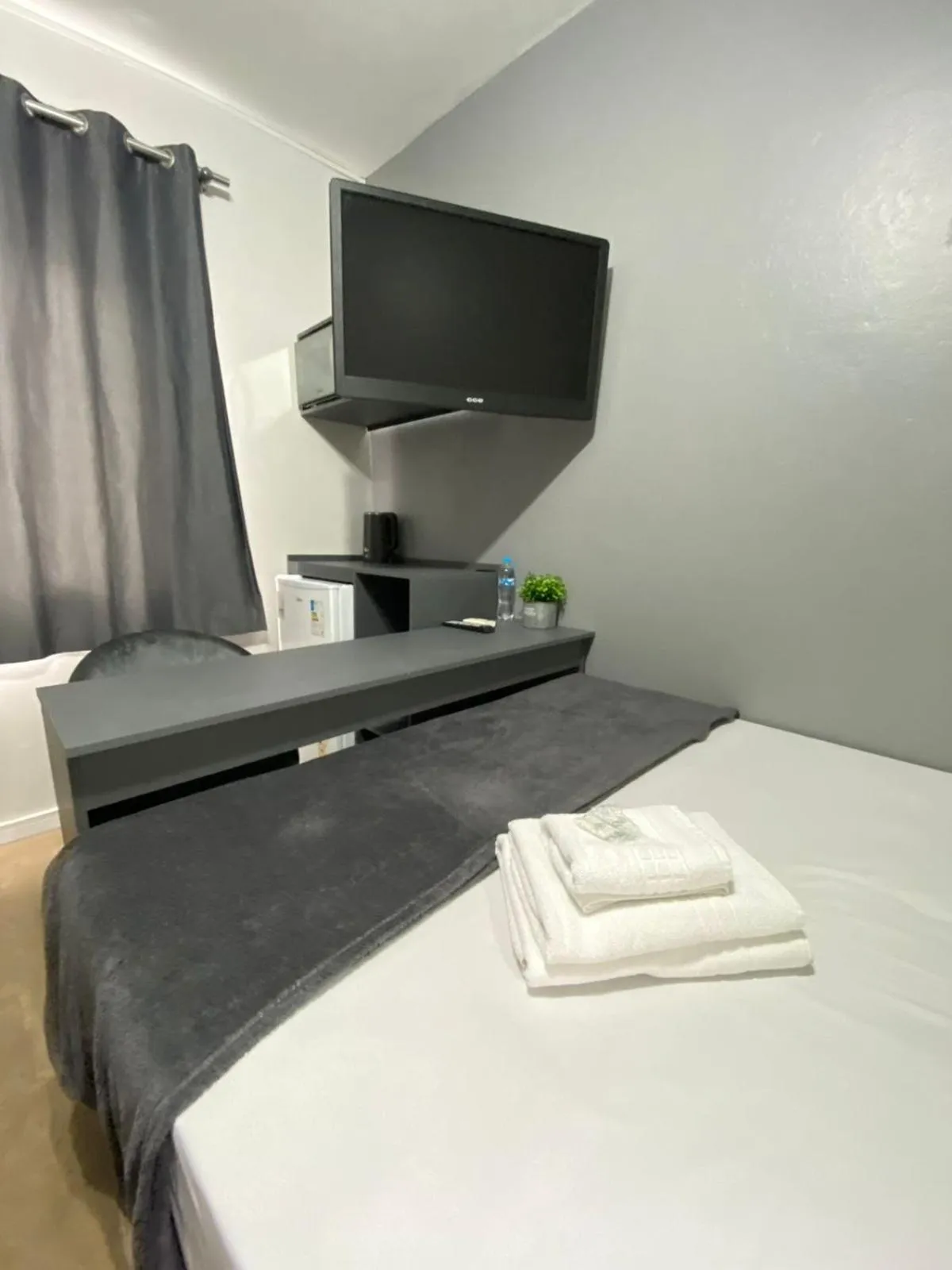 Bed in Rezende Suítes