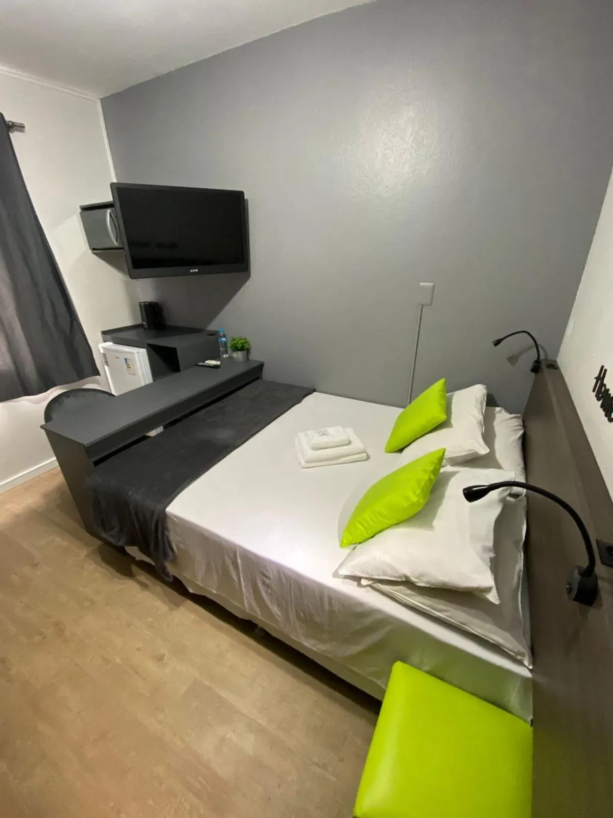 Bed in Rezende Suítes