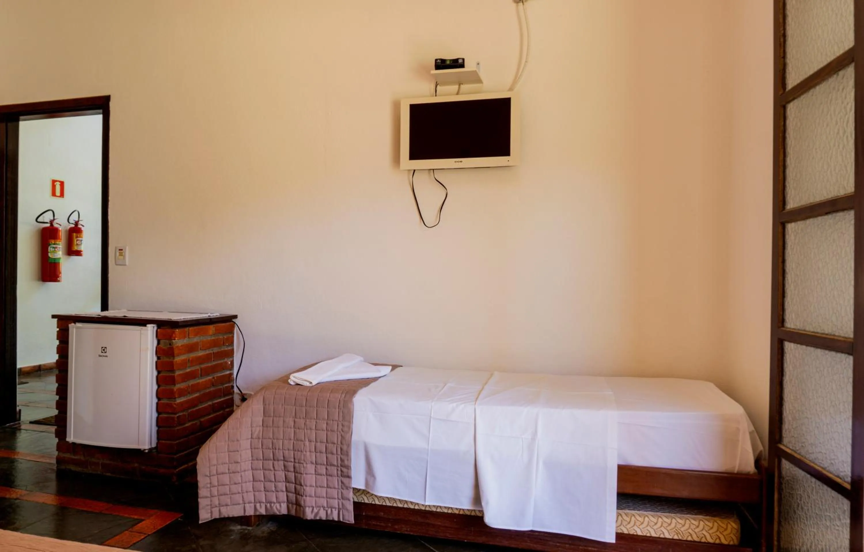 Bed in Pousada Casarão